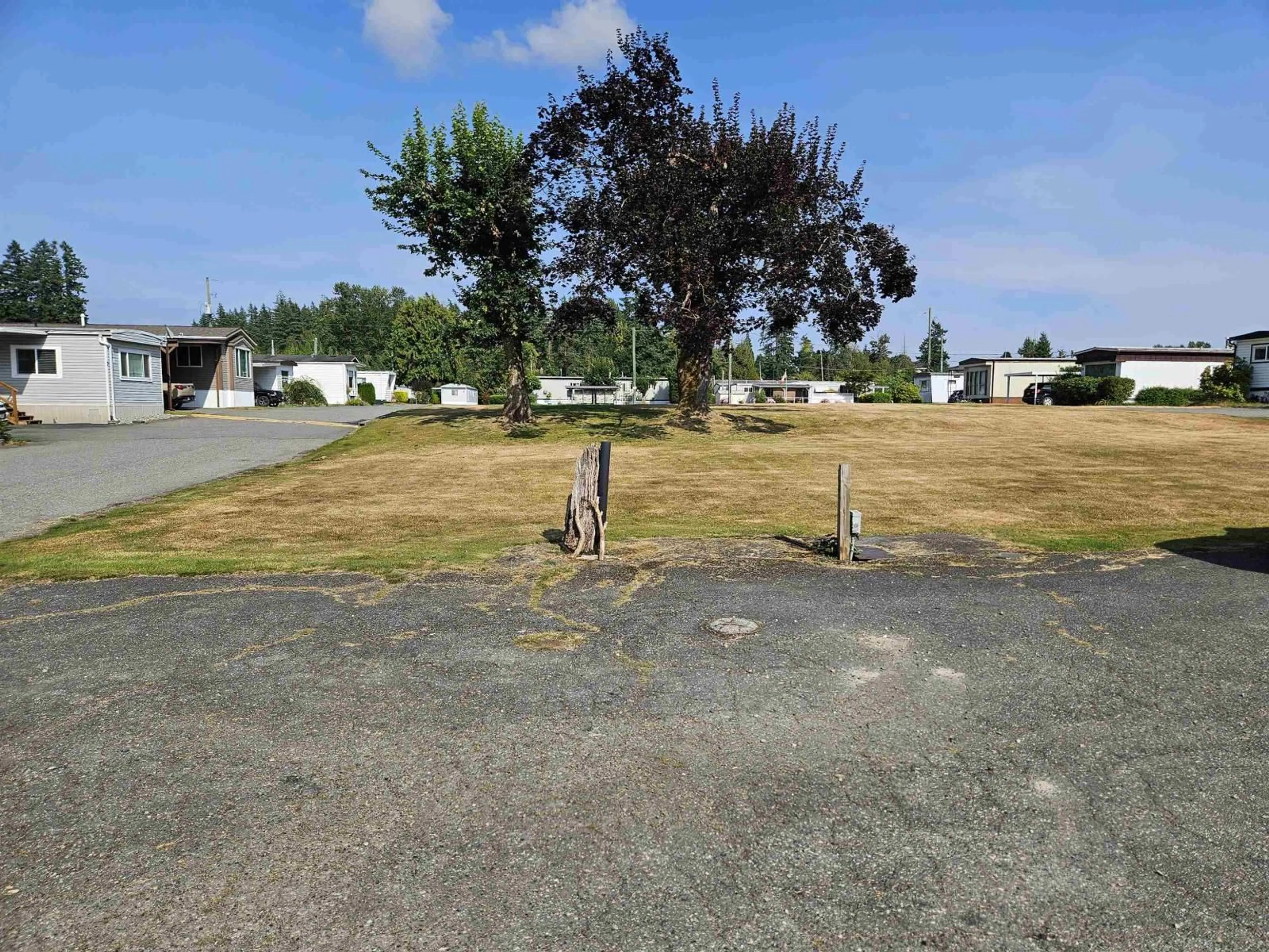 A pic from outside/outdoor area/front of a property/back of a property/a pic from drone, street for 24 - 4426 232, Langley British Columbia V2Z2R3