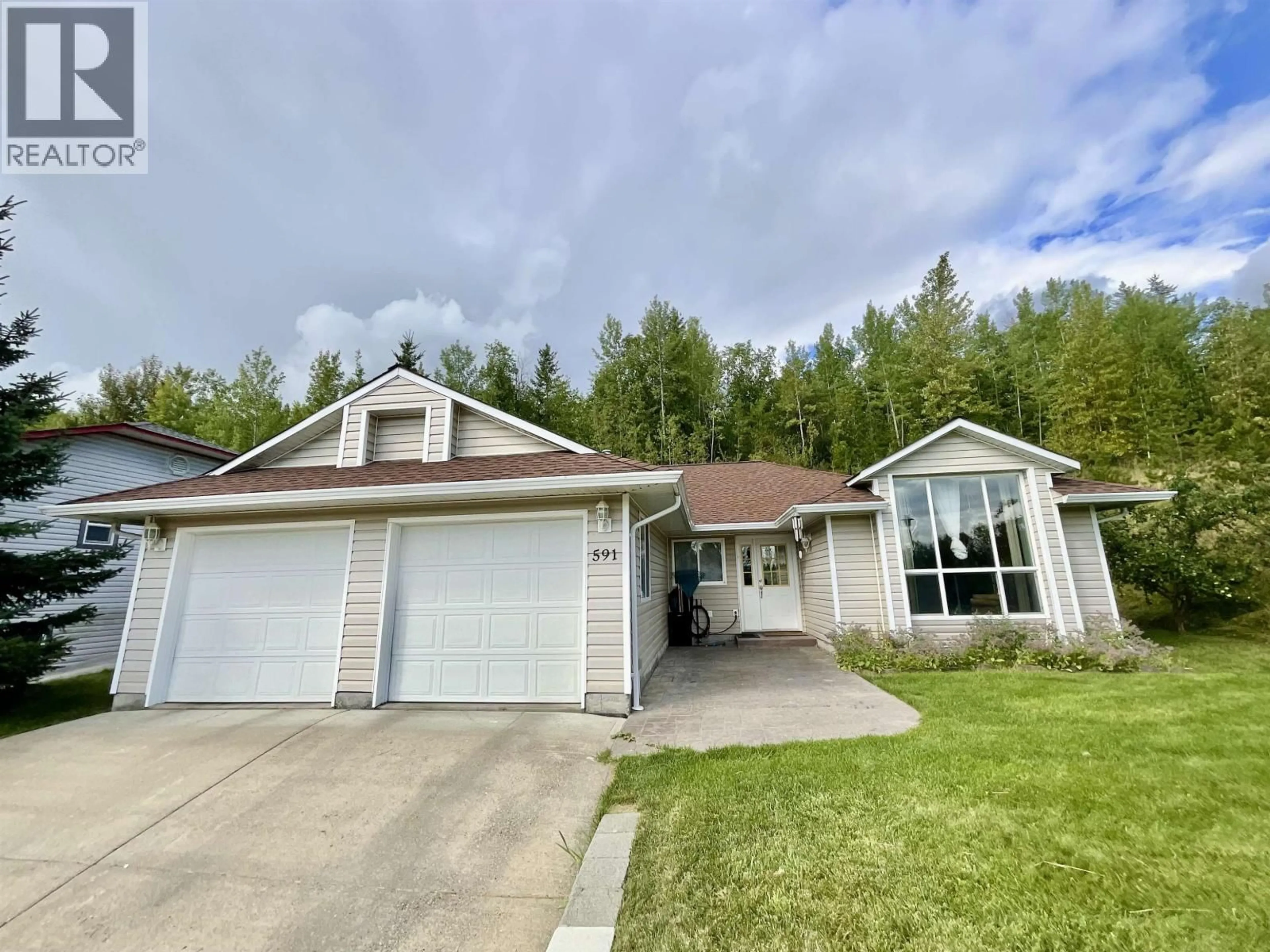 Home with vinyl exterior material, street for 591 DONNELLY STREET, Quesnel British Columbia V2J6B7