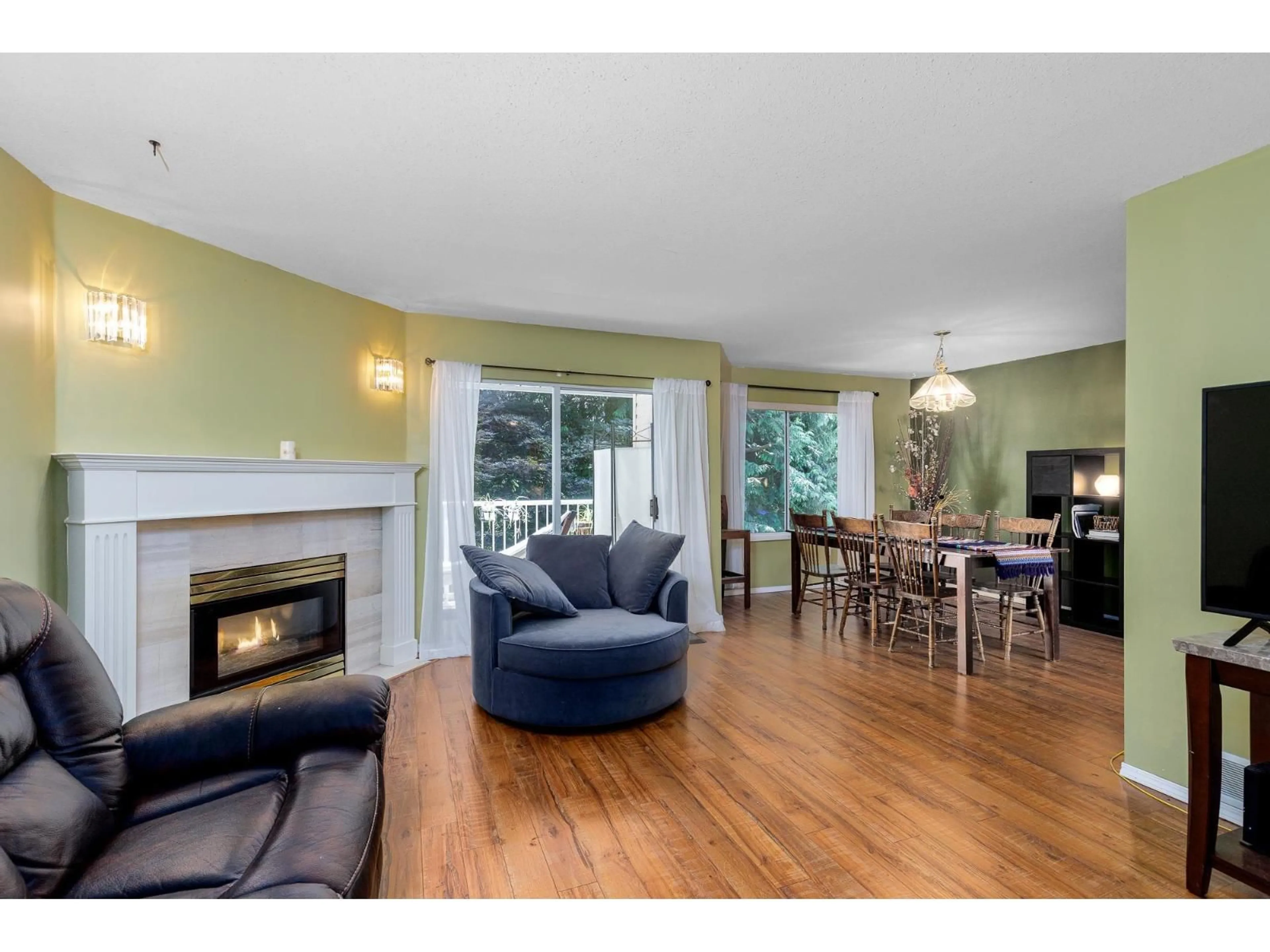 Living room with furniture, wood/laminate floor for 14 - 32339 7, Mission British Columbia V2V6T7