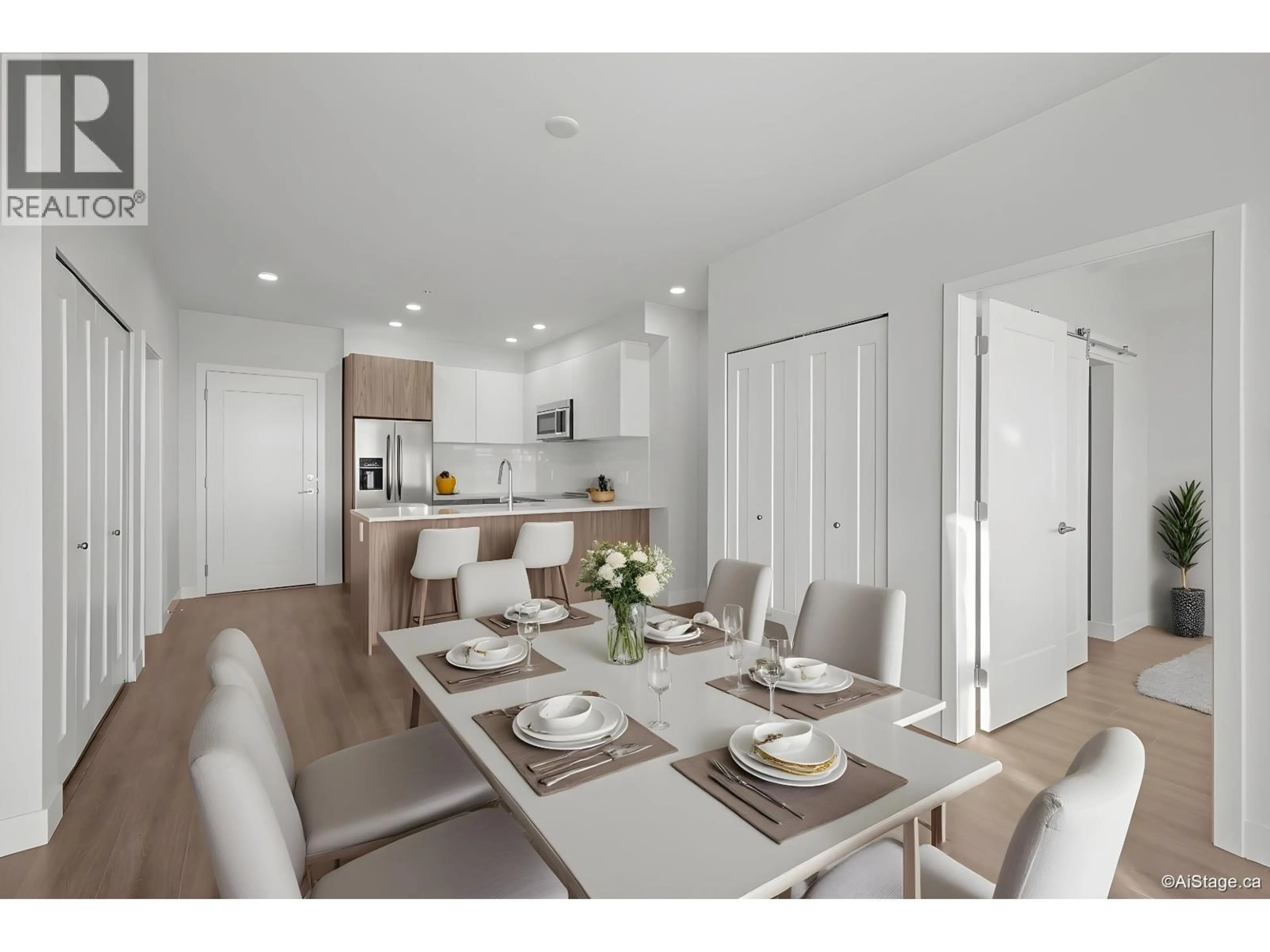 Open concept kitchen, wood/laminate floor for 303 - 5535 HASTINGS STREET, Burnaby British Columbia V5B1R2