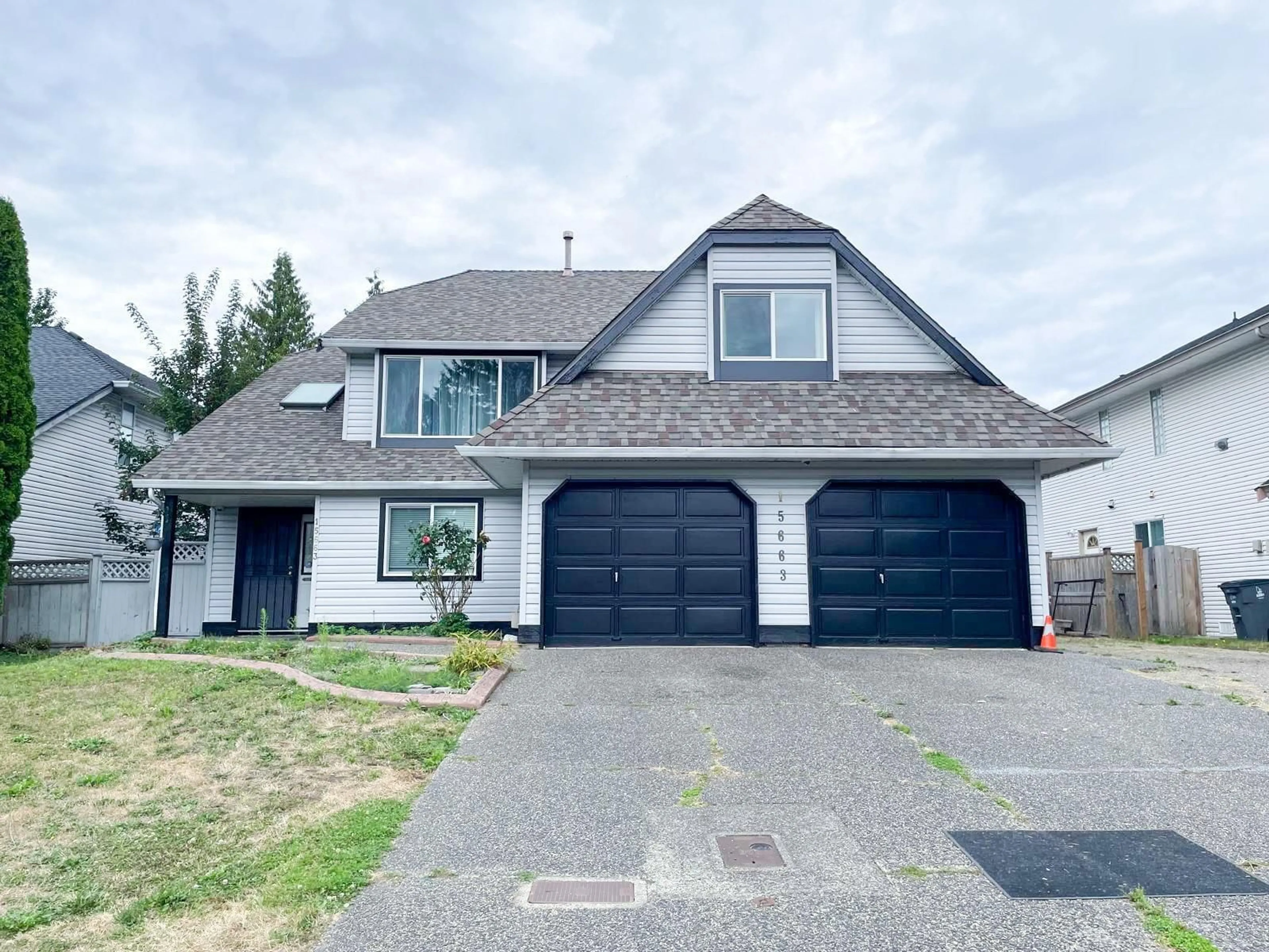 Home with vinyl exterior material, street for 15663 107A, Surrey British Columbia V4N3H9