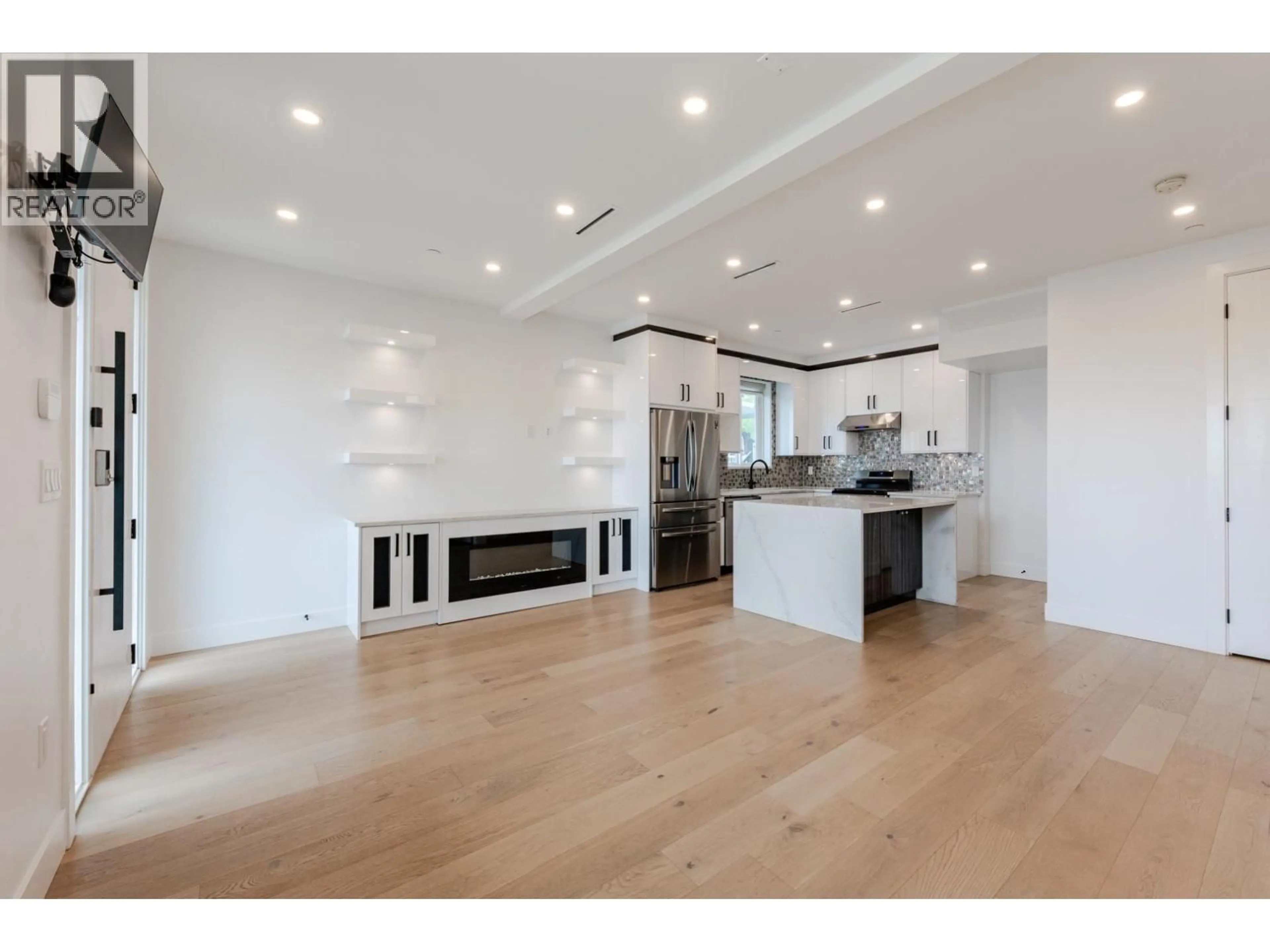 Open concept kitchen, wood/laminate floor for 2723 TURNER STREET, Vancouver British Columbia V5K2G8