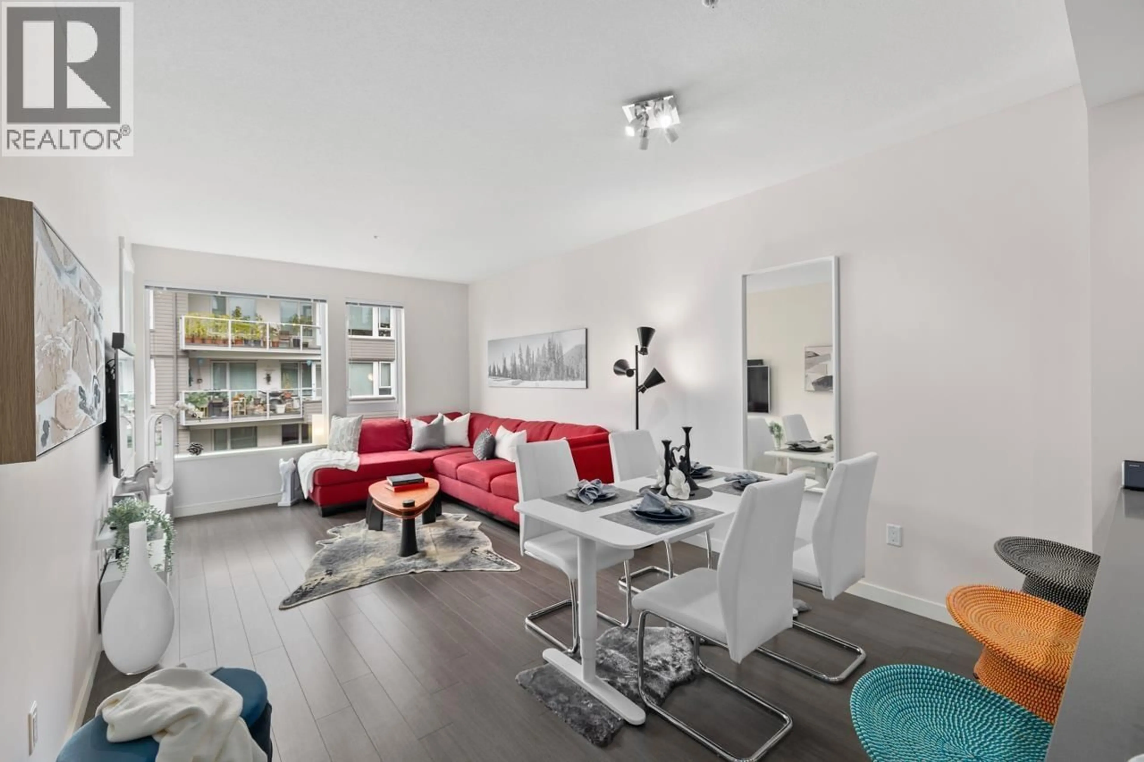 Living room with furniture, unknown for 411 - 255 1ST STREET, North Vancouver British Columbia V7M3G8