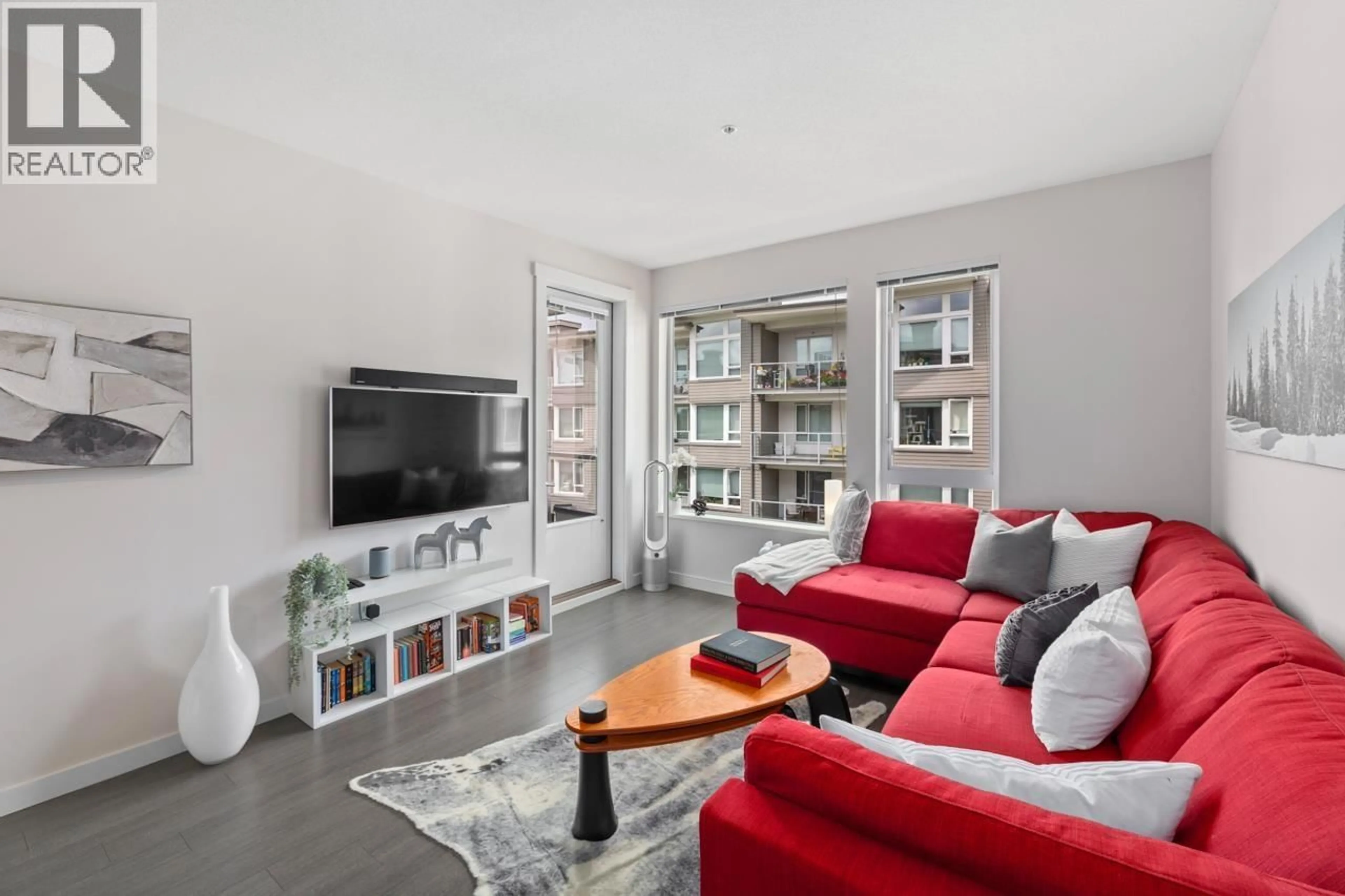 Living room with furniture, unknown for 411 - 255 1ST STREET, North Vancouver British Columbia V7M3G8