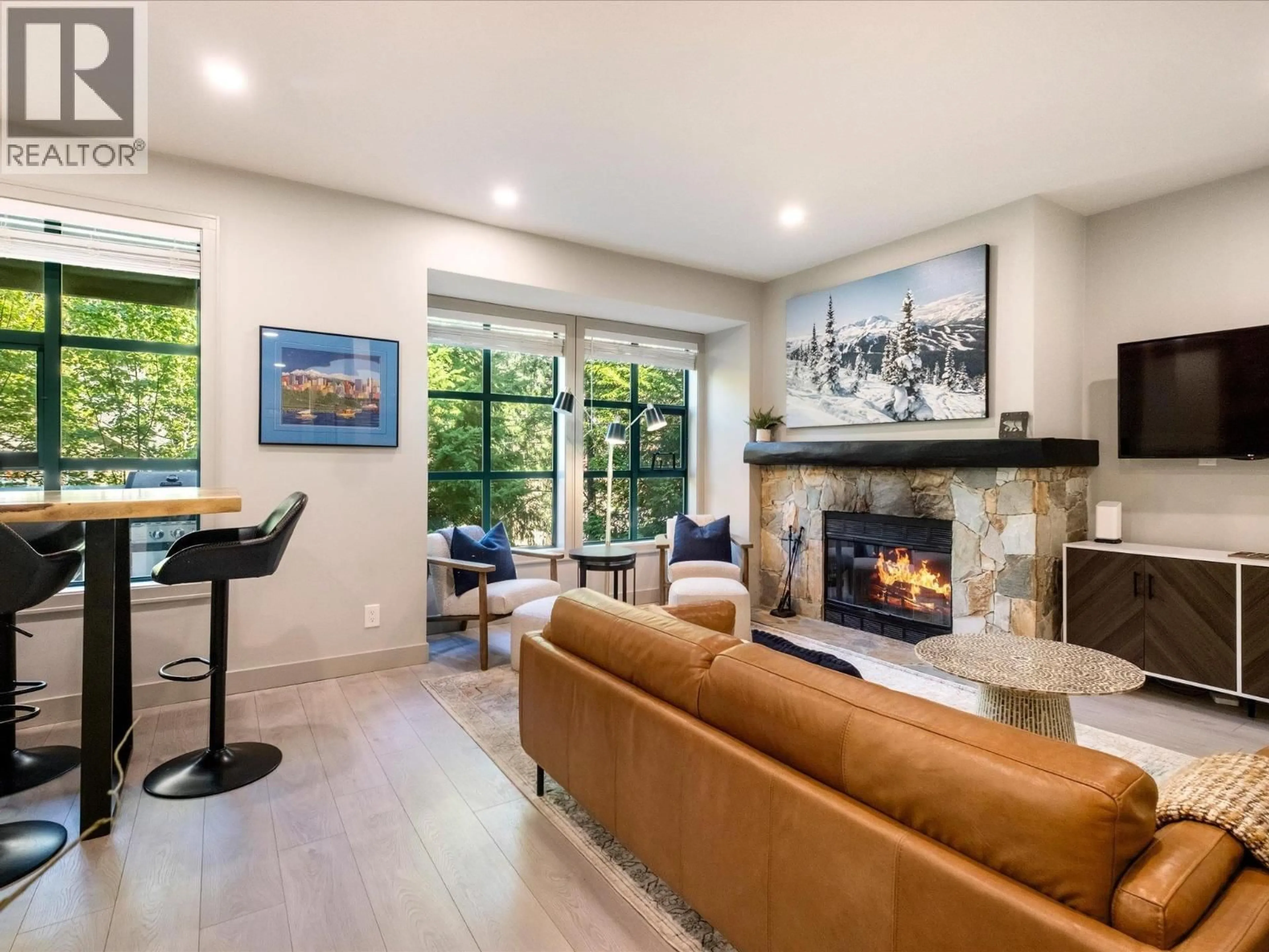 Living room with furniture, ceramic/tile floor for 33 - 4652 BLACKCOMB WAY, Whistler British Columbia V8E0X2