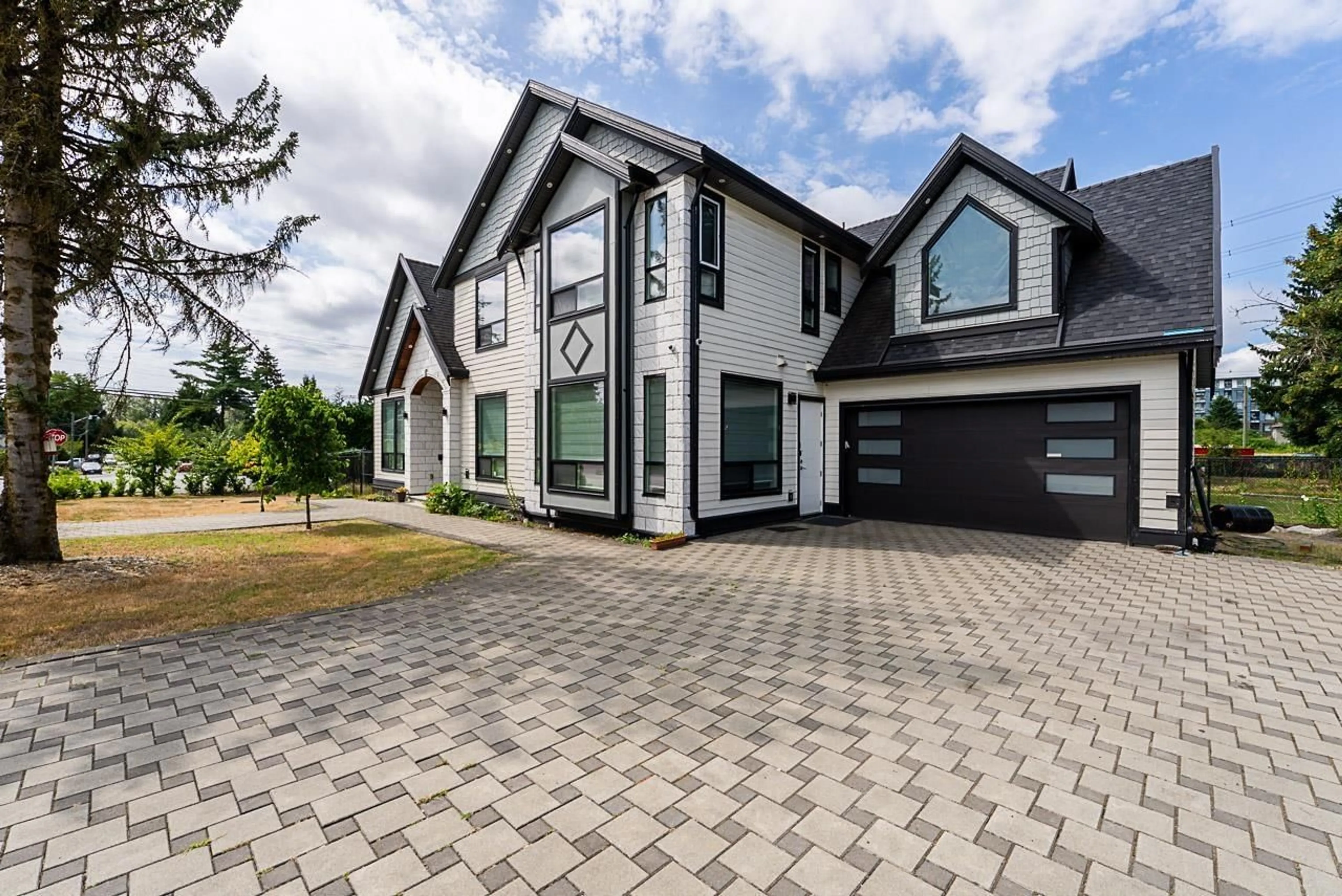 Home with brick exterior material, street for 10805 141, Surrey British Columbia V3R3J5