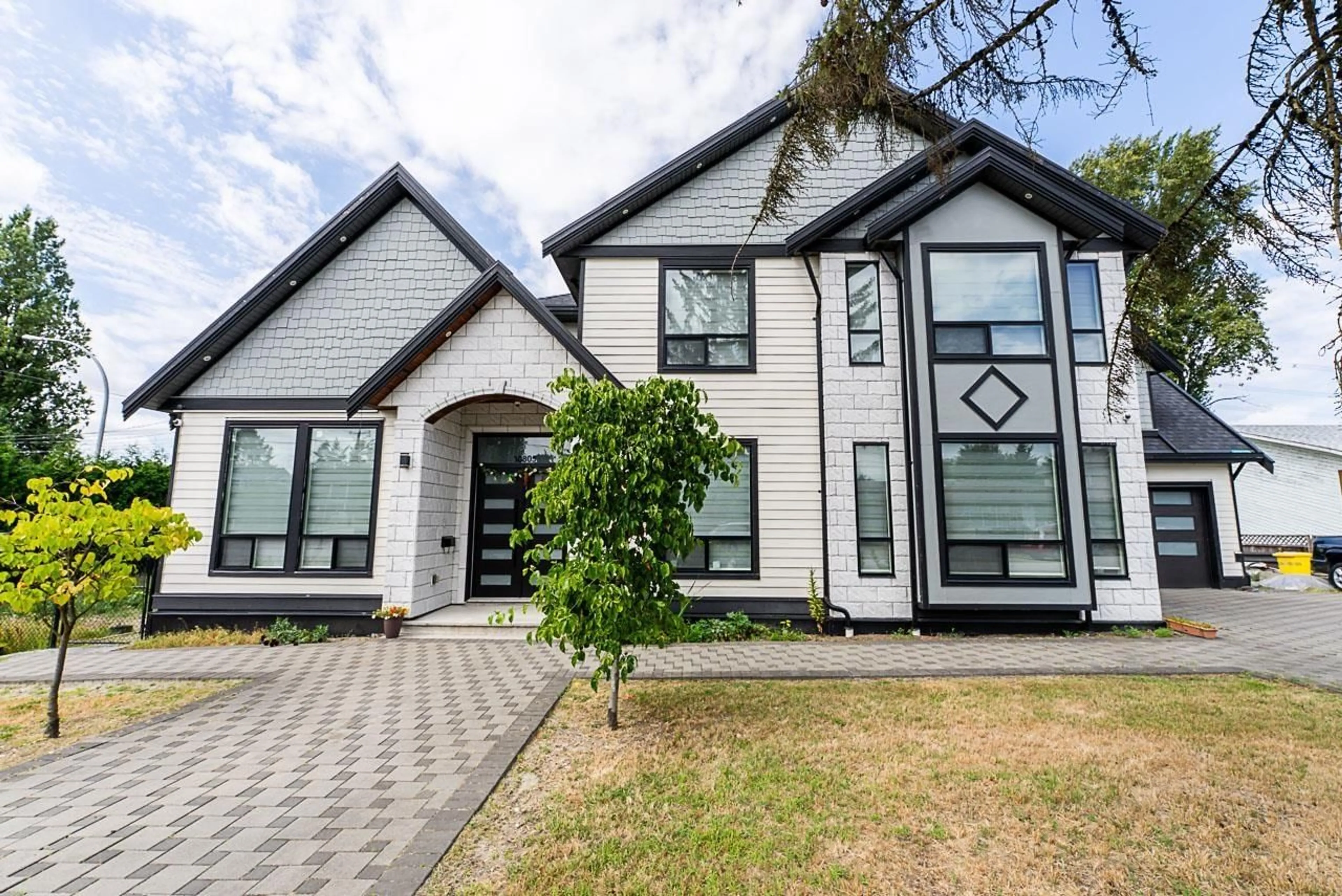 Home with brick exterior material, street for 10805 141, Surrey British Columbia V3R3J5