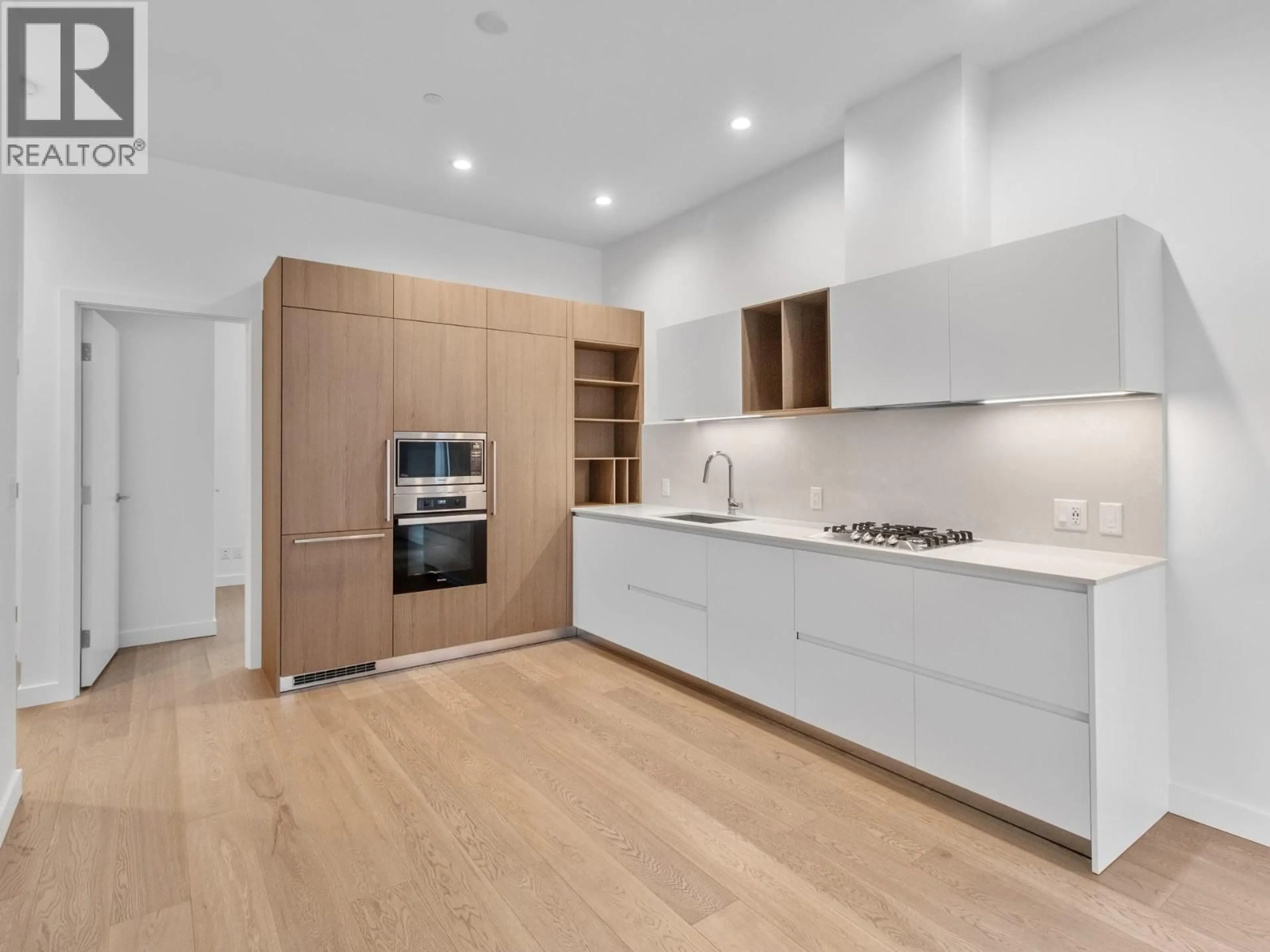Open concept kitchen, unknown for 307 - 6000 MCKAY AVENUE, Burnaby British Columbia V5H0K2