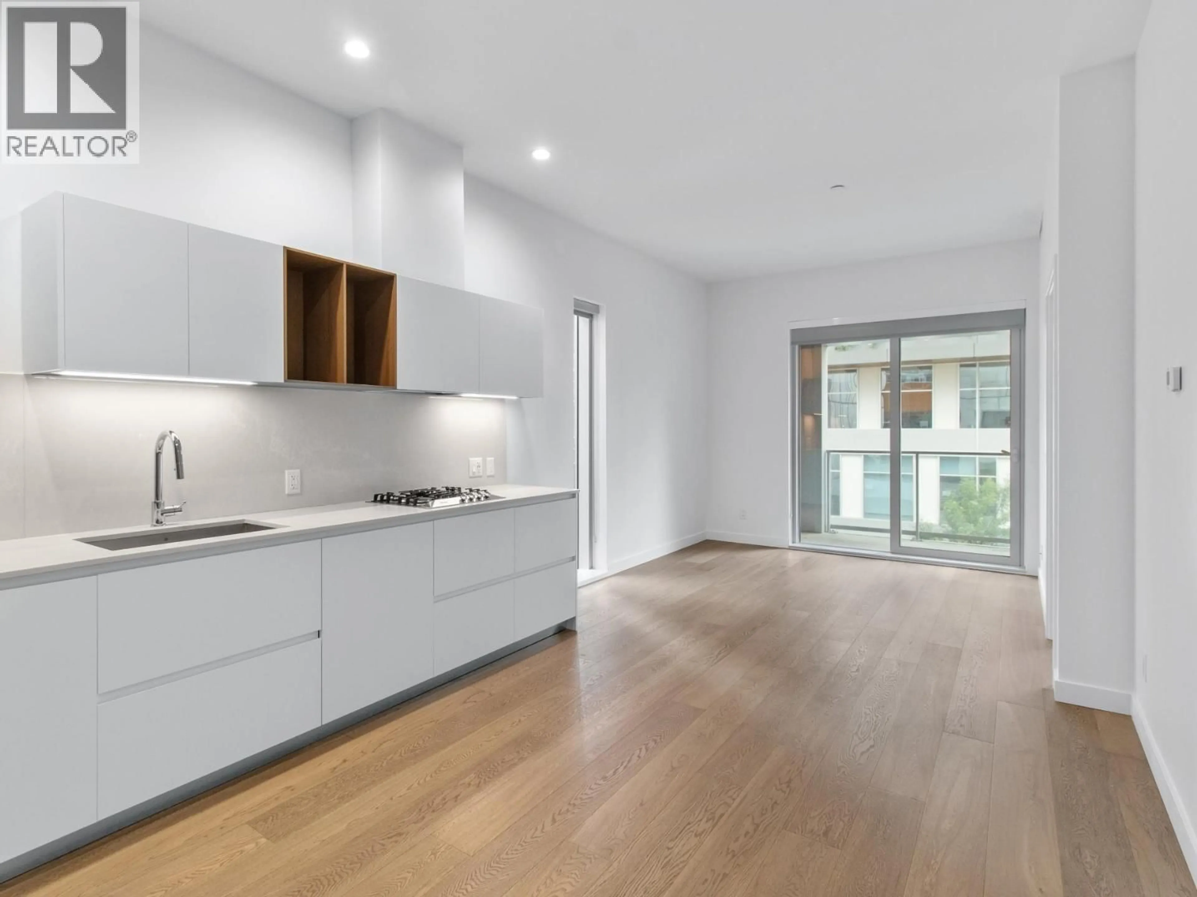 Open concept kitchen, unknown for 307 - 6000 MCKAY AVENUE, Burnaby British Columbia V5H0K2