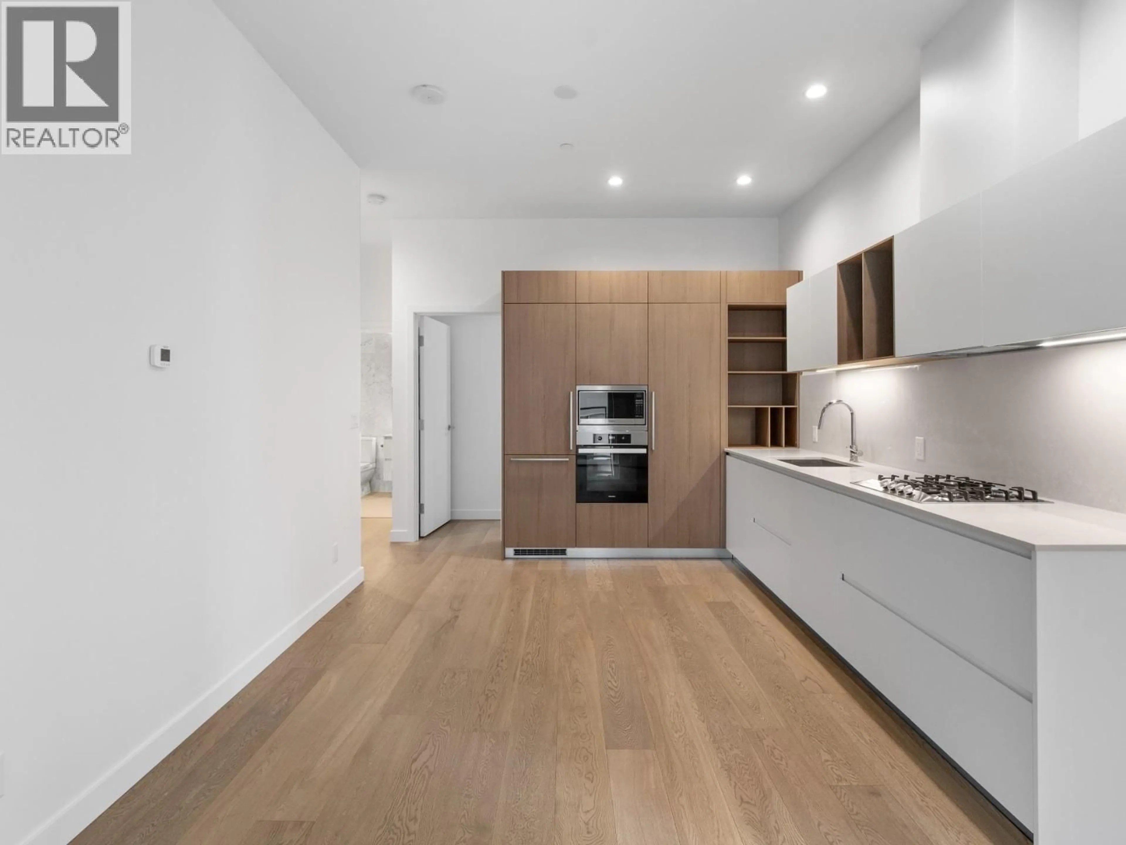 Open concept kitchen, unknown for 307 - 6000 MCKAY AVENUE, Burnaby British Columbia V5H0K2