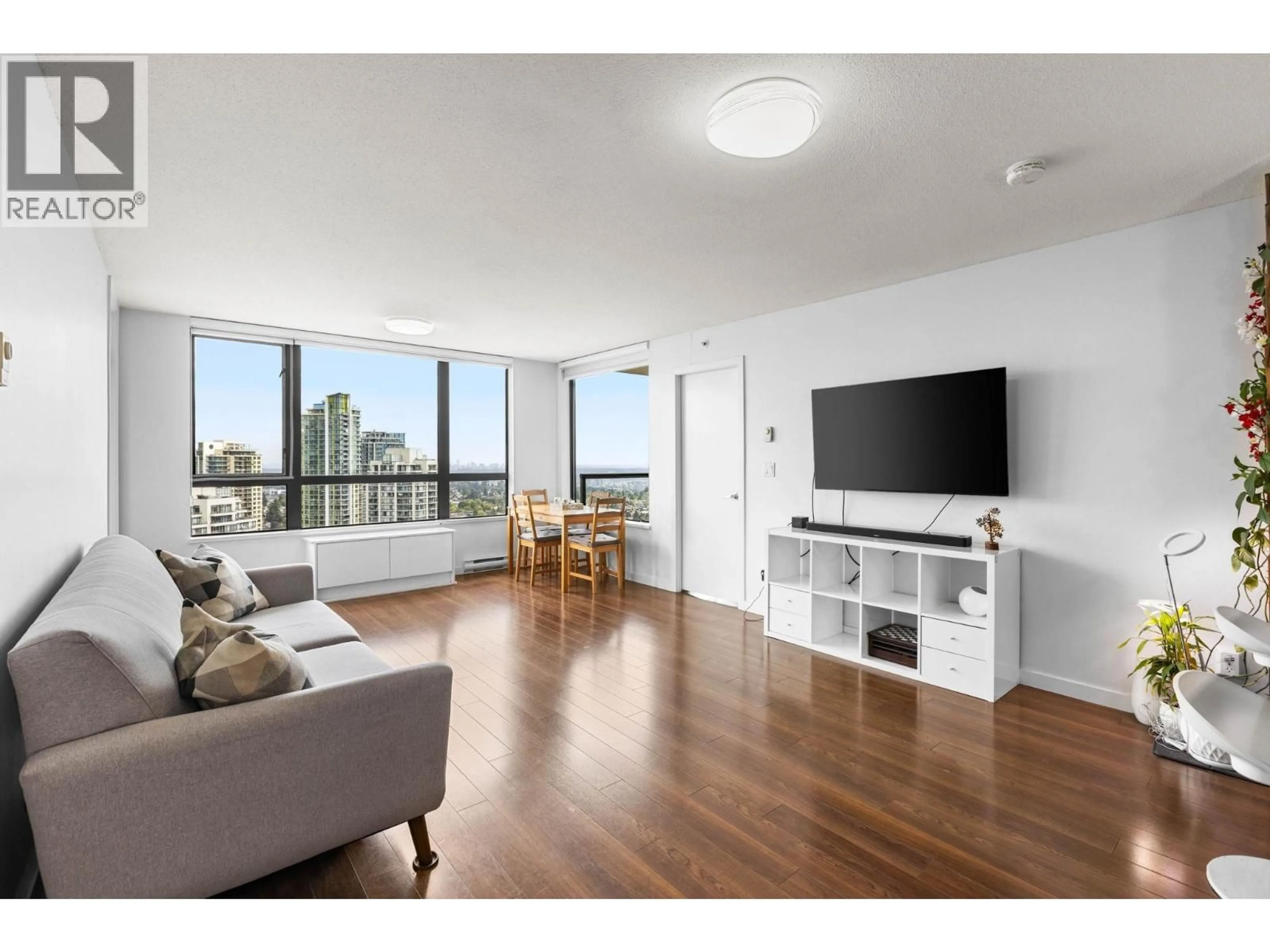 Living room with furniture, wood/laminate floor for 2705 - 7063 HALL AVENUE, Burnaby British Columbia V5E0A5