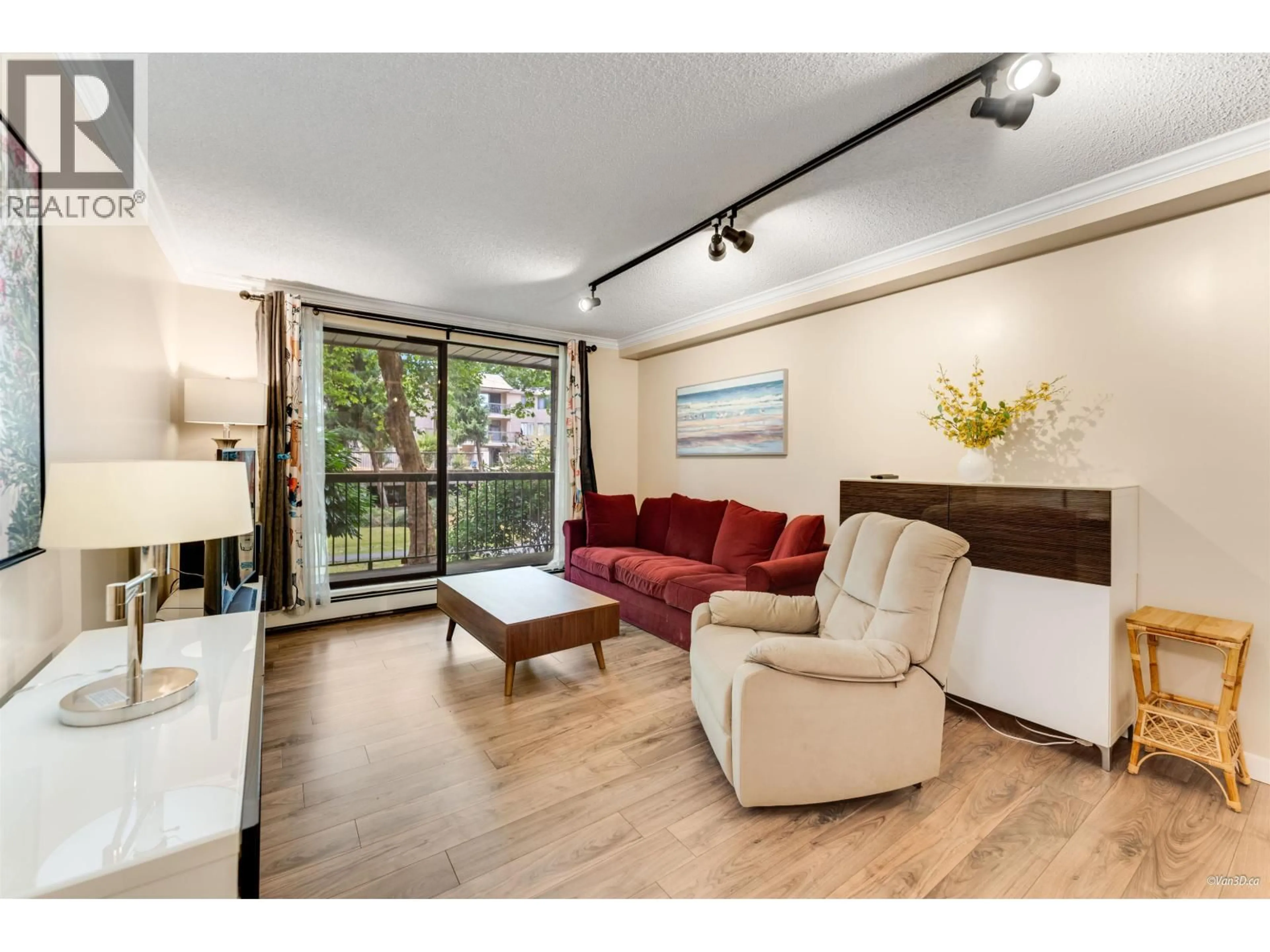 Living room with furniture, wood/laminate floor for 126 - 8460 LANSDOWNE ROAD, Richmond British Columbia V6X3G8