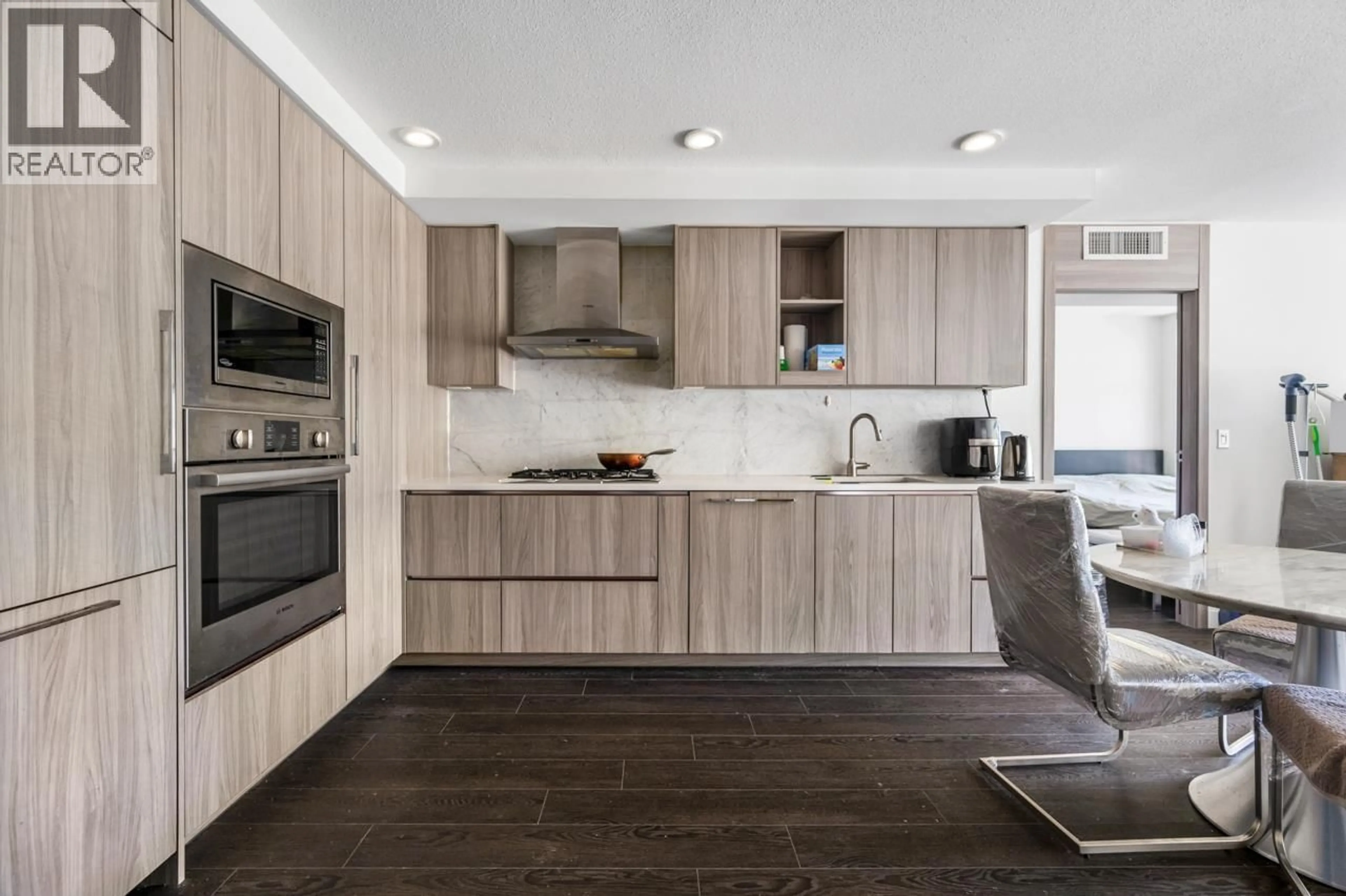 Contemporary kitchen, wood/laminate floor for 581 - 3311 KETCHESON ROAD, Richmond British Columbia V6X0S4