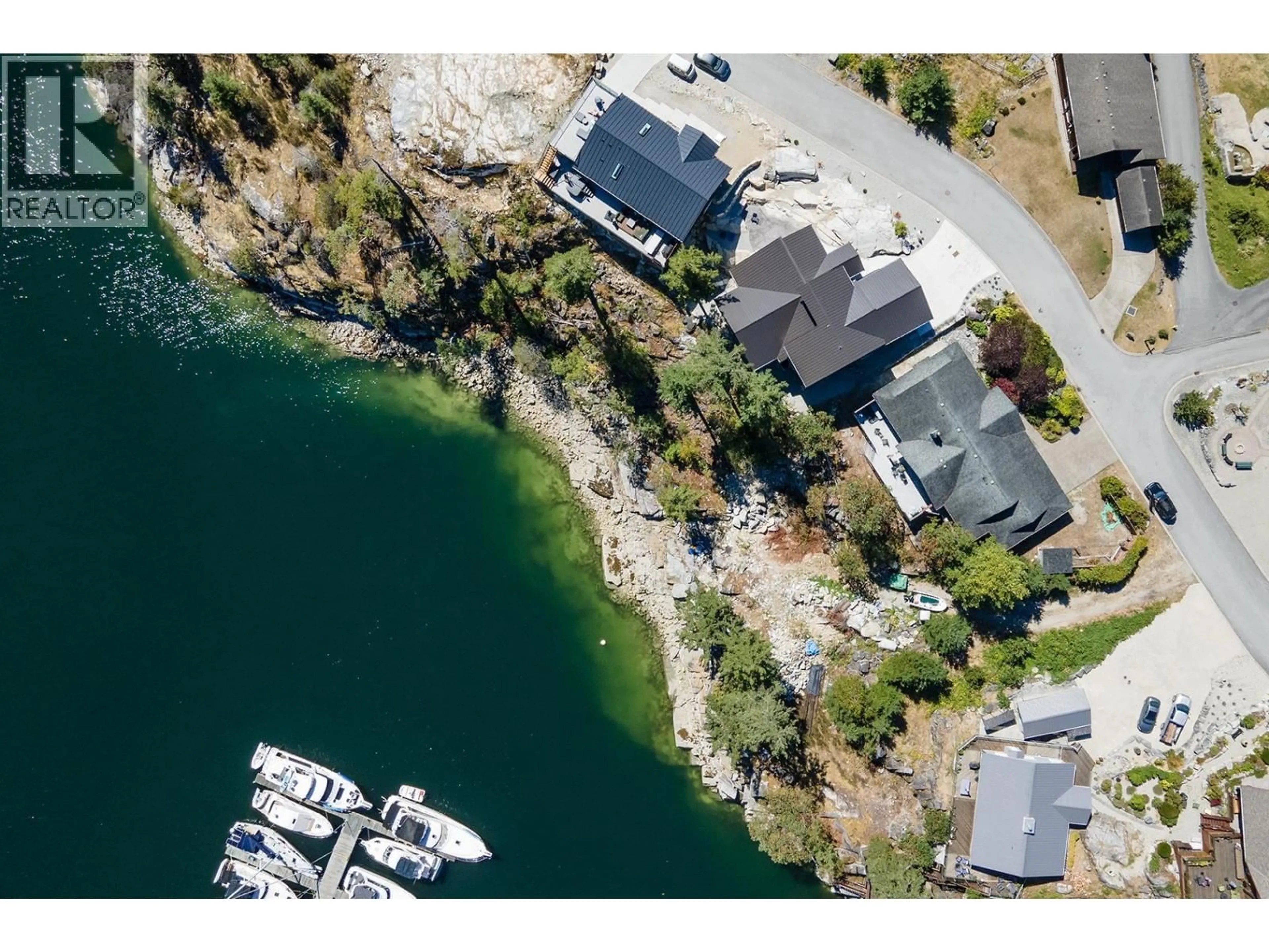 A pic from outside/outdoor area/front of a property/back of a property/a pic from drone, water/lake/river/ocean view for 22 - 4622 SINCLAIR BAY ROAD, Pender Harbour British Columbia V0N1S1