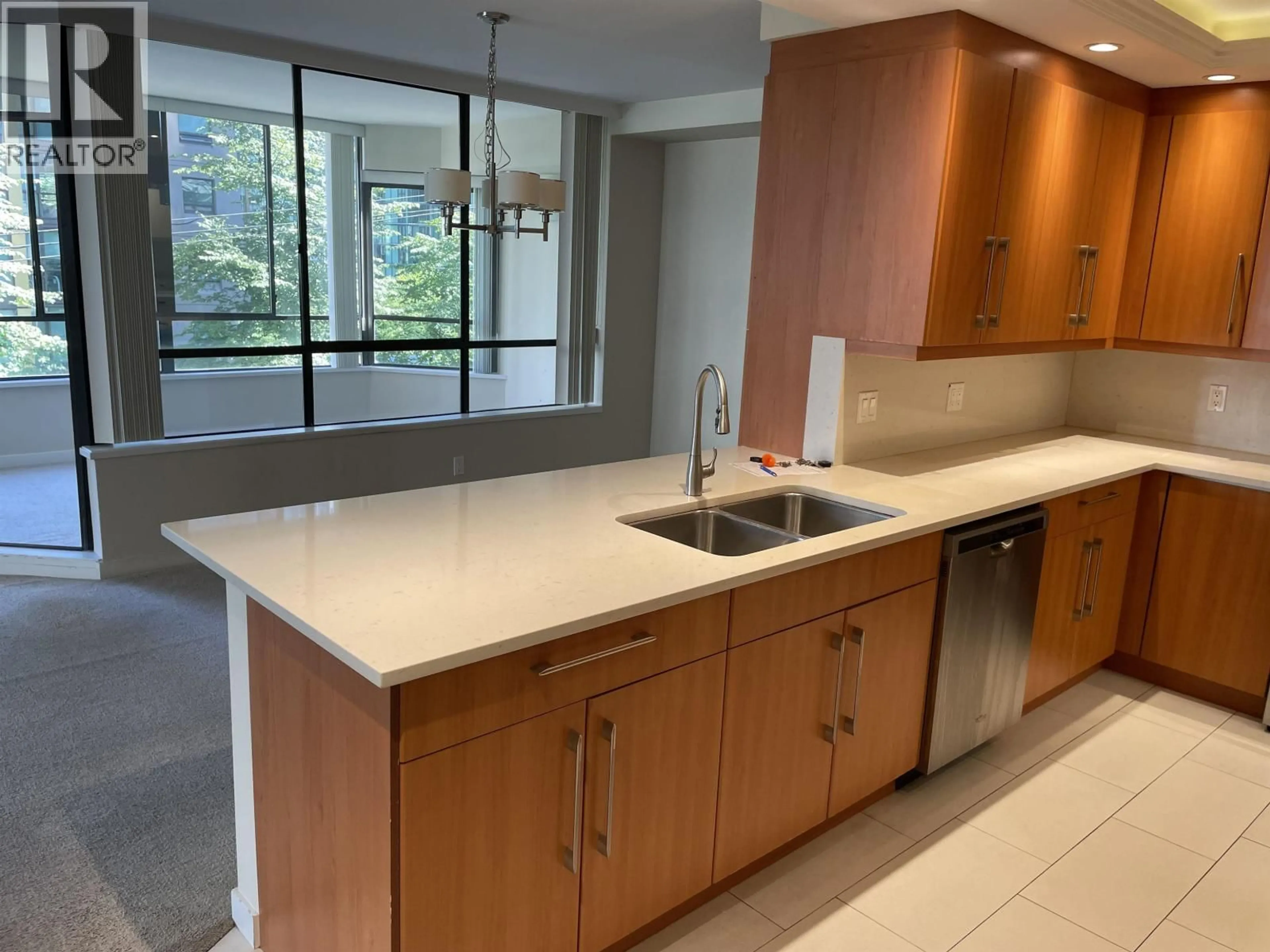 Open concept kitchen, ceramic/tile floor for 201 - 738 BROUGHTON STREET, Vancouver British Columbia V6G3A7
