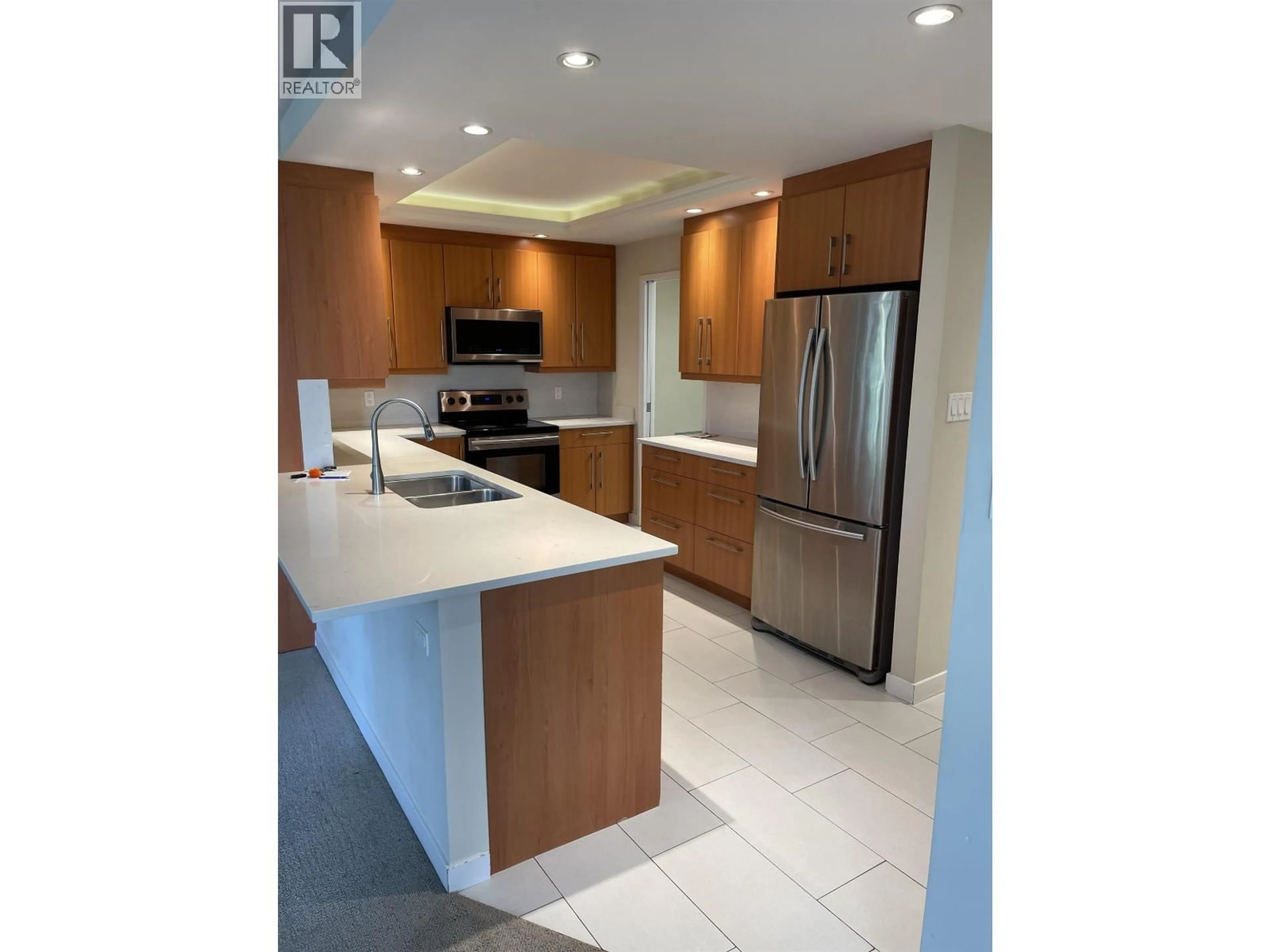Open concept kitchen, ceramic/tile floor for 201 - 738 BROUGHTON STREET, Vancouver British Columbia V6G3A7