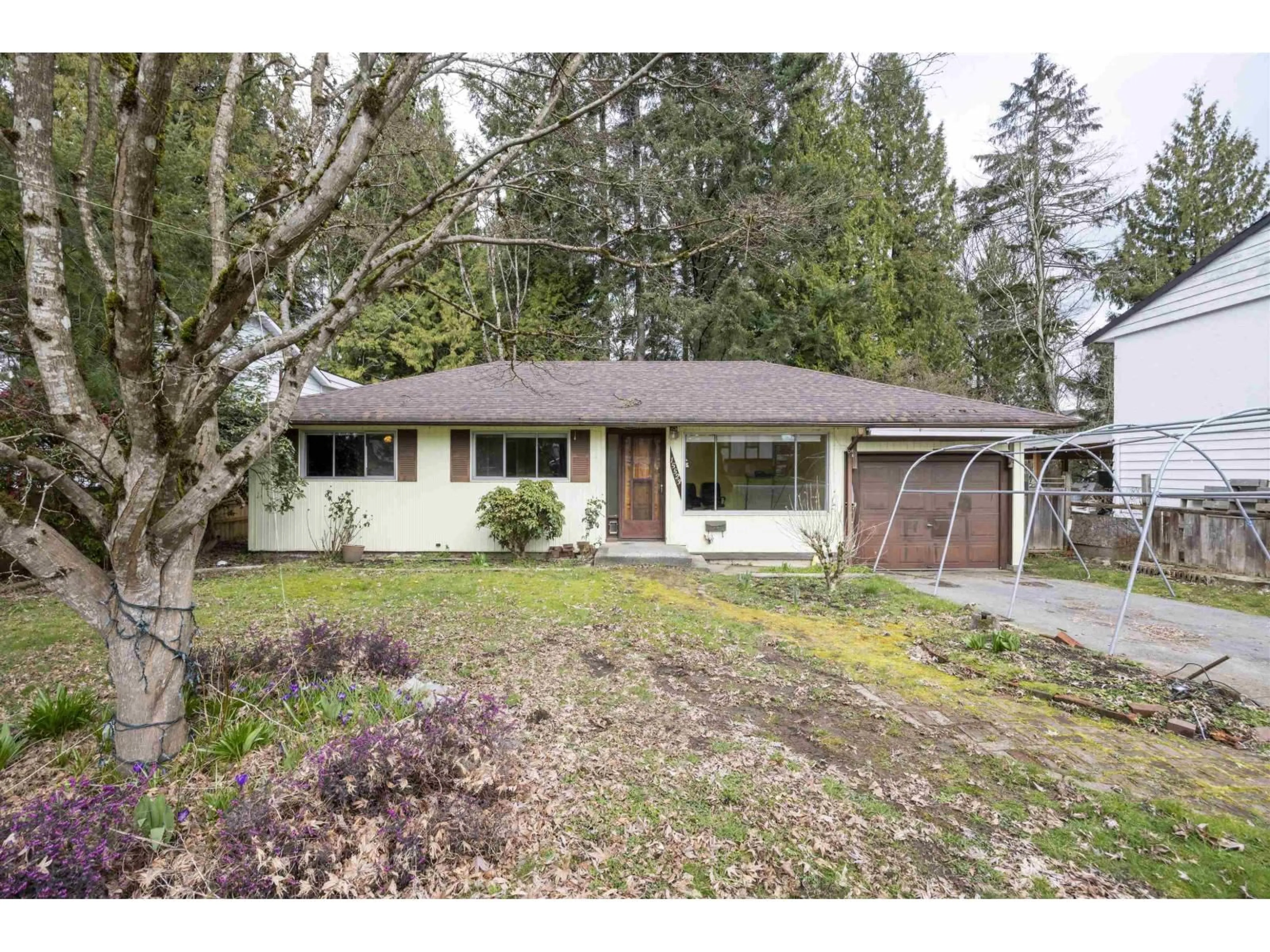 Home with vinyl exterior material, street for 15523 105A, Surrey British Columbia V3R1S7
