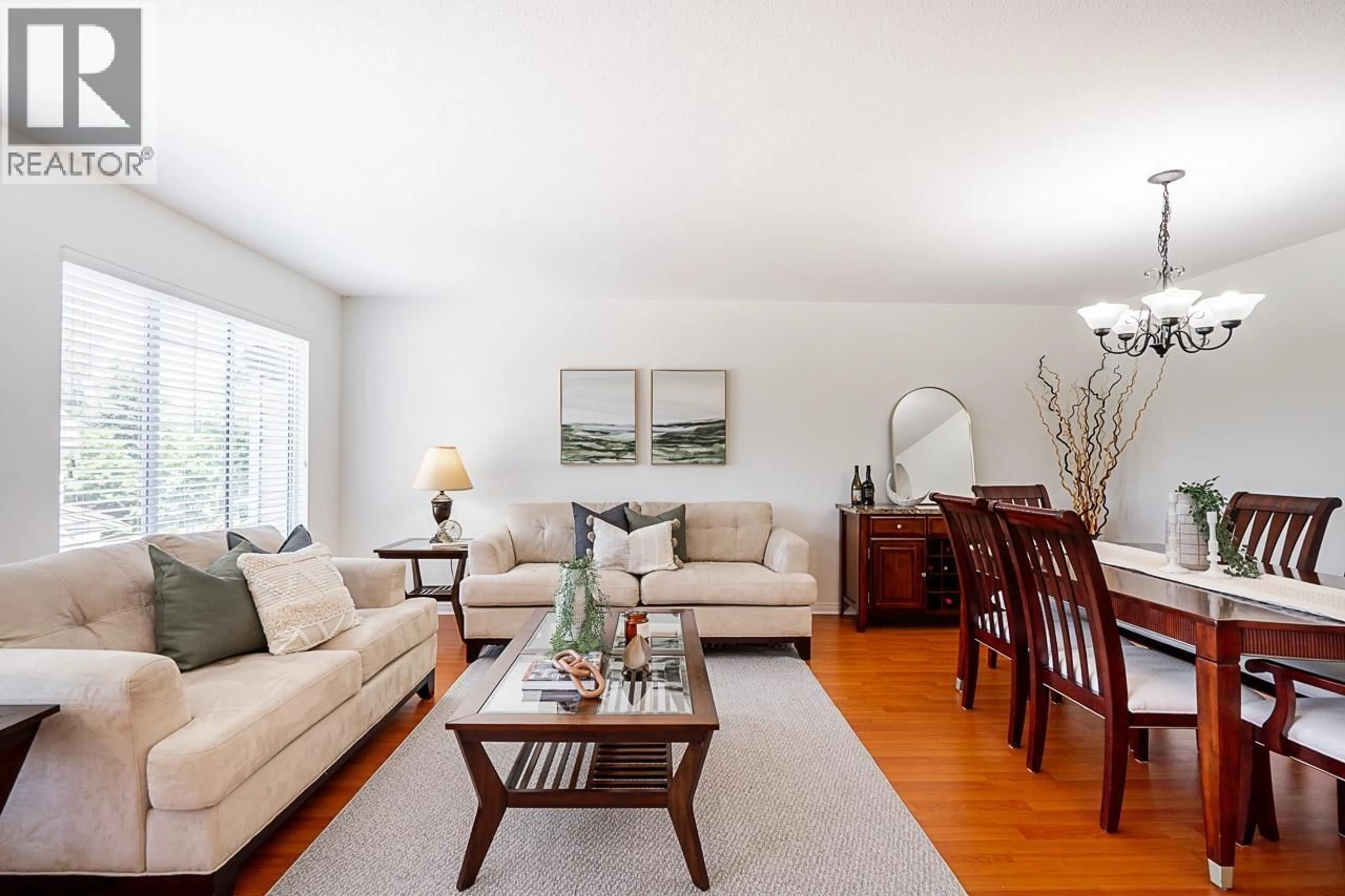 Living room with furniture, wood/laminate floor for 36 - 7465 MULBERRY PLACE, Burnaby British Columbia V3N5A1