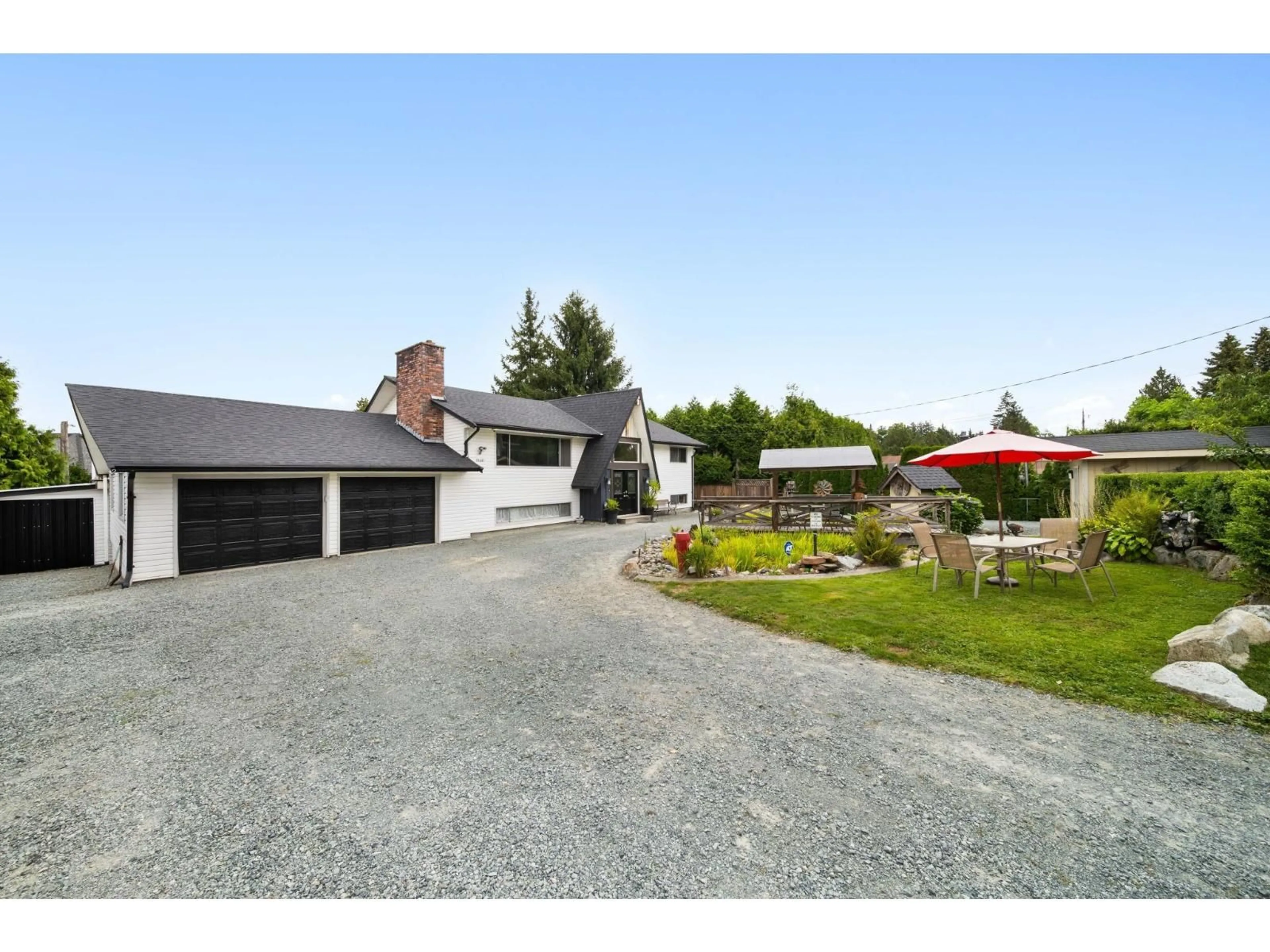 A pic from outside/outdoor area/front of a property/back of a property/a pic from drone, street for 19691 49, Langley British Columbia V3A3R2
