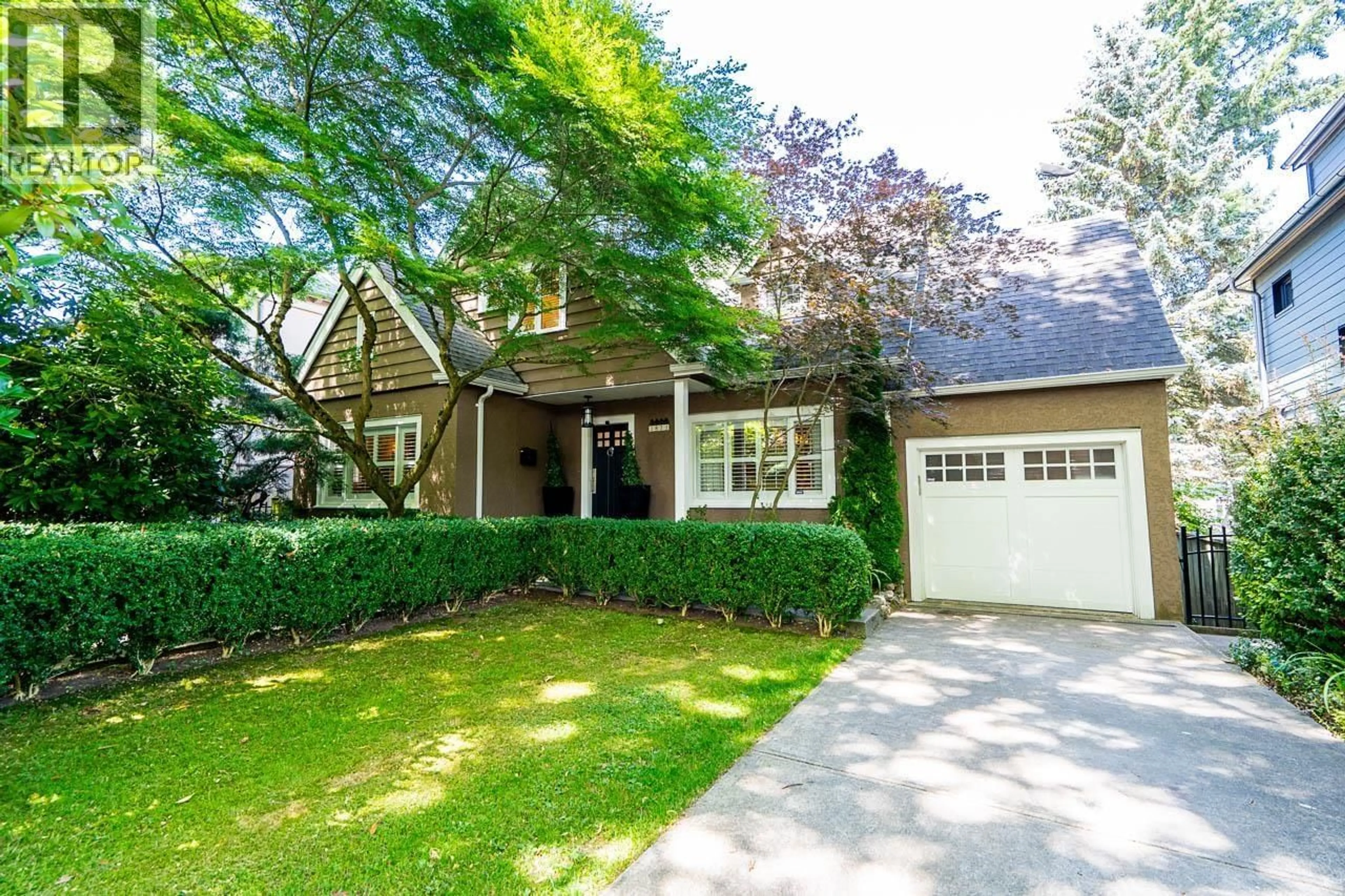 Home with brick exterior material, street for 3821 BROADWAY, Vancouver British Columbia V6R2C2
