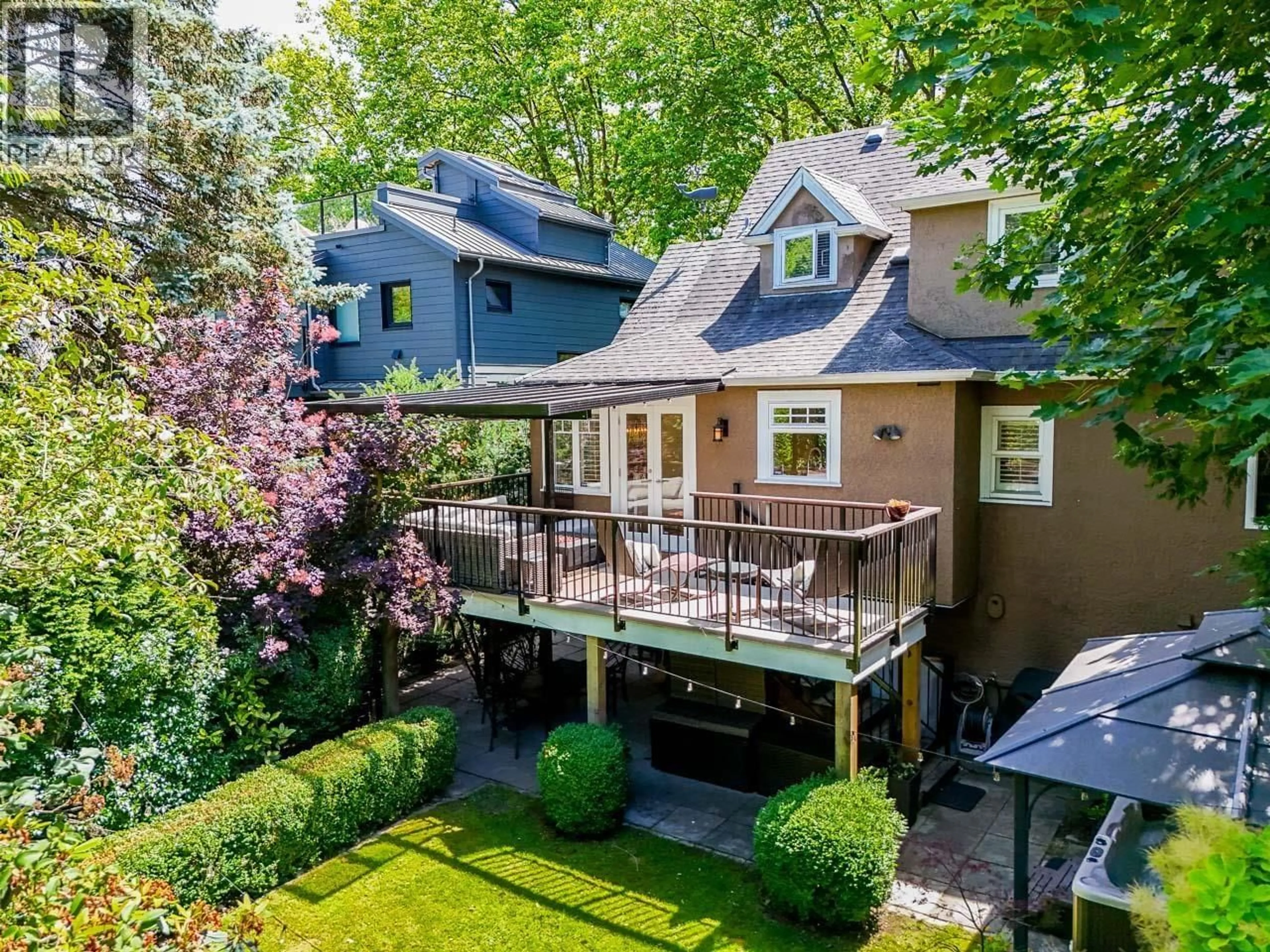 A pic from outside/outdoor area/front of a property/back of a property/a pic from drone, street for 3821 BROADWAY, Vancouver British Columbia V6R2C2