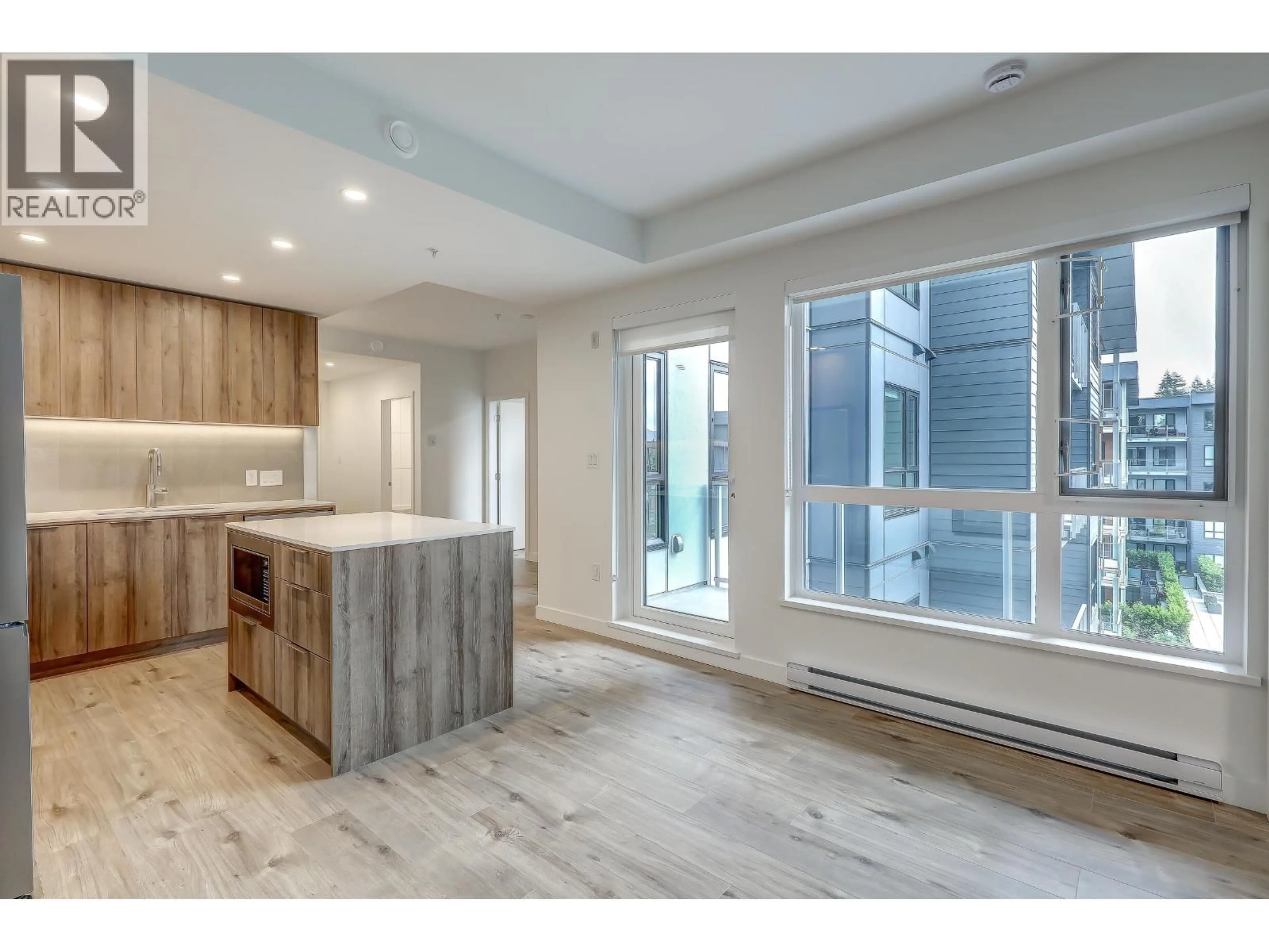 Open concept kitchen, unknown for 517 - 3594 MALSUM DRIVE, North Vancouver British Columbia V7G0B5