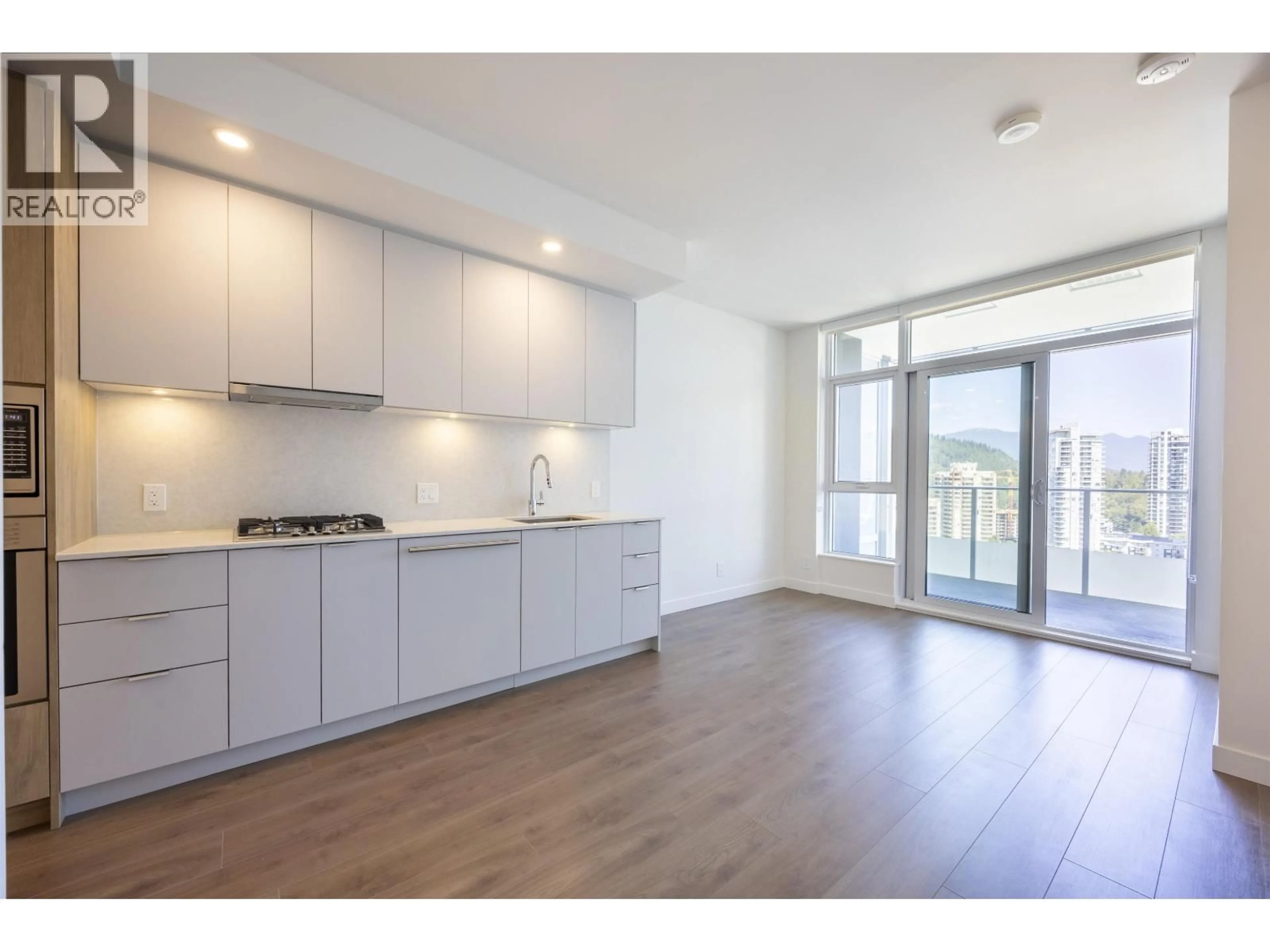 Open concept kitchen, wood/laminate floor for 1608 - 537 COTTONWOOD AVENUE, Coquitlam British Columbia V3J0S4