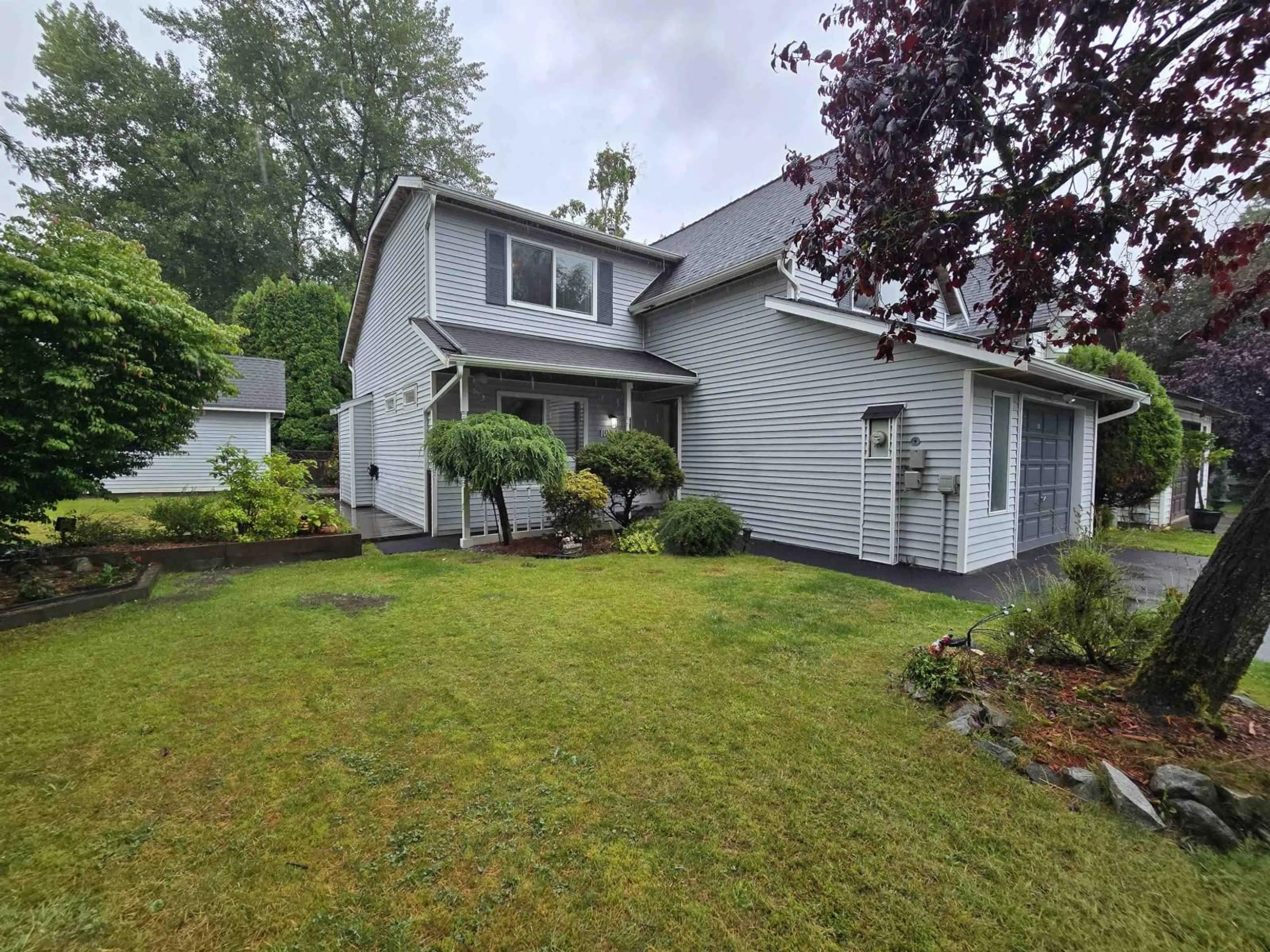 Home with vinyl exterior material, street for 19853 50A, Langley British Columbia V3A7L1