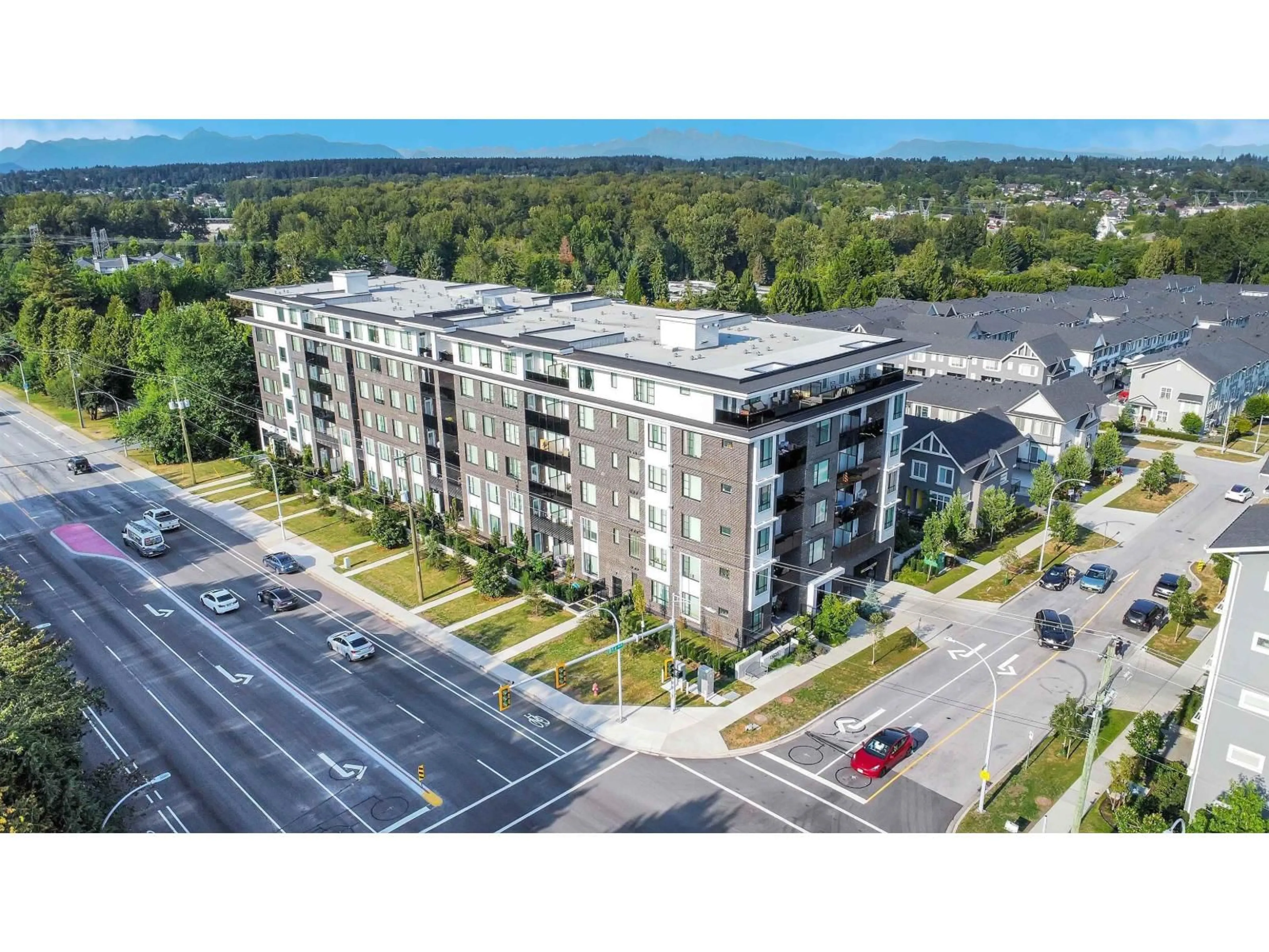 A pic from outside/outdoor area/front of a property/back of a property/a pic from drone, building for 502 - 13623 81A, Surrey British Columbia V3W3N7