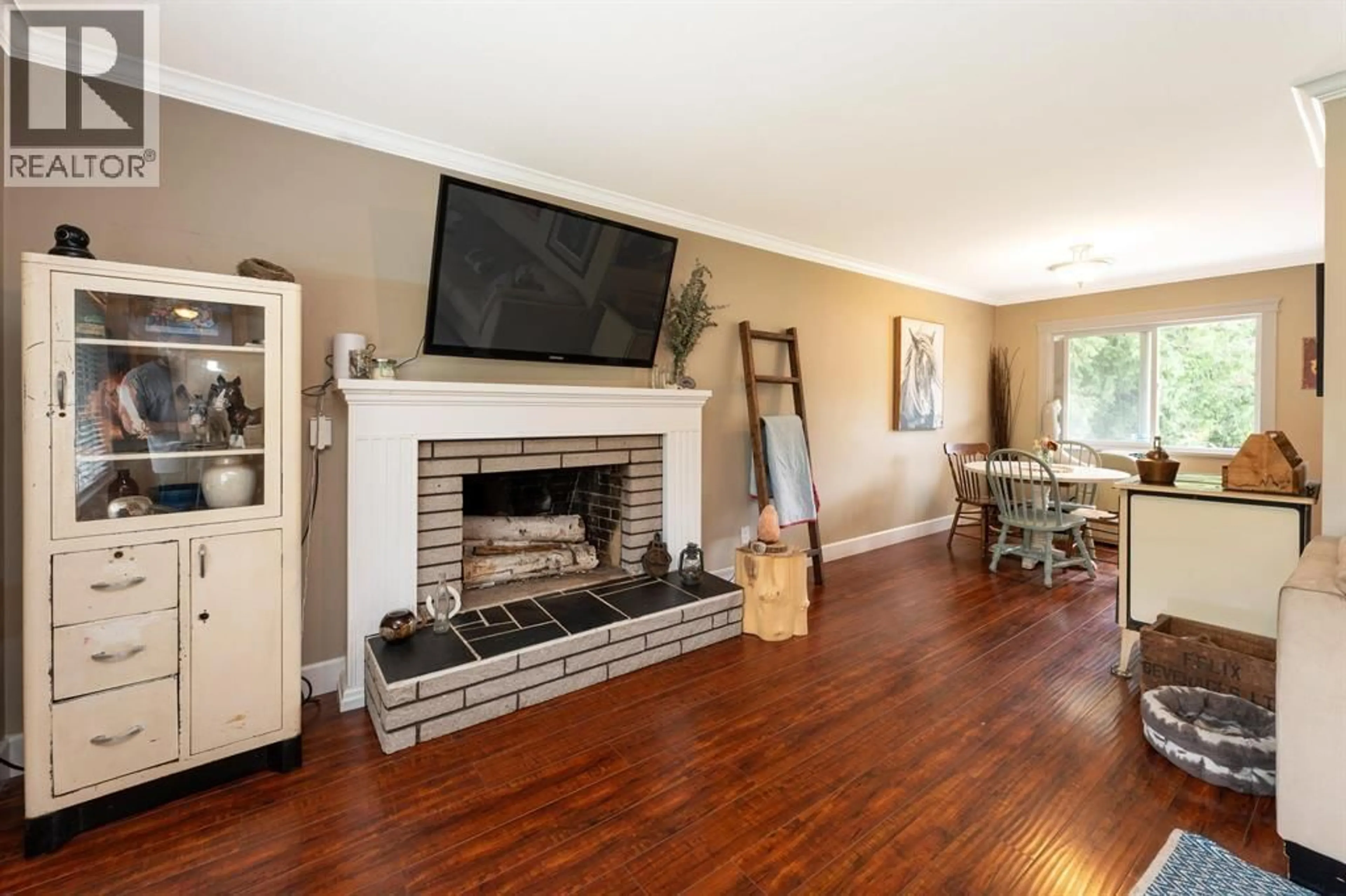 Living room with furniture, wood/laminate floor for 12290 252 STREET, Maple Ridge British Columbia V4R1G6