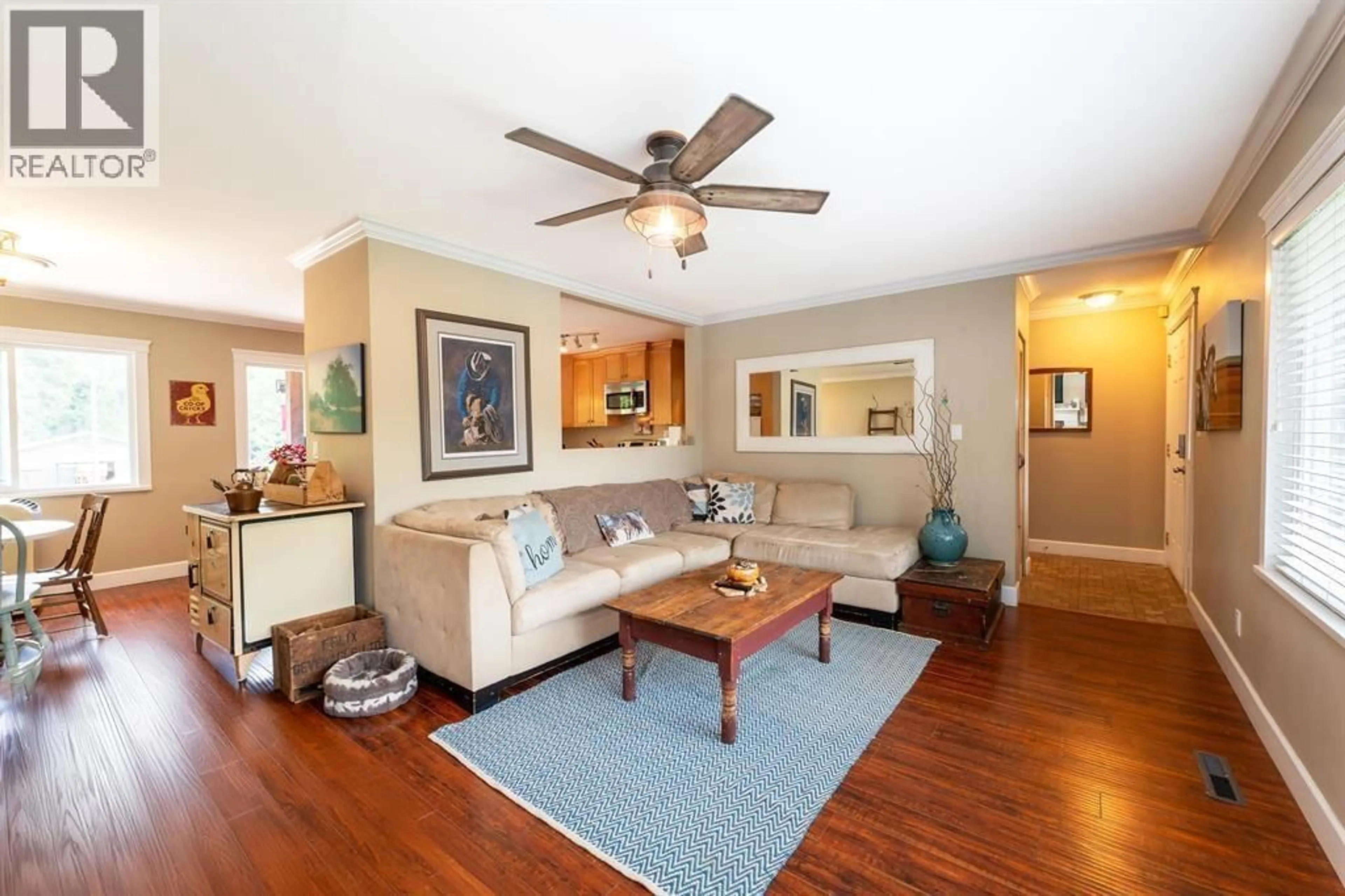 Living room with furniture, wood/laminate floor for 12290 252 STREET, Maple Ridge British Columbia V4R1G6