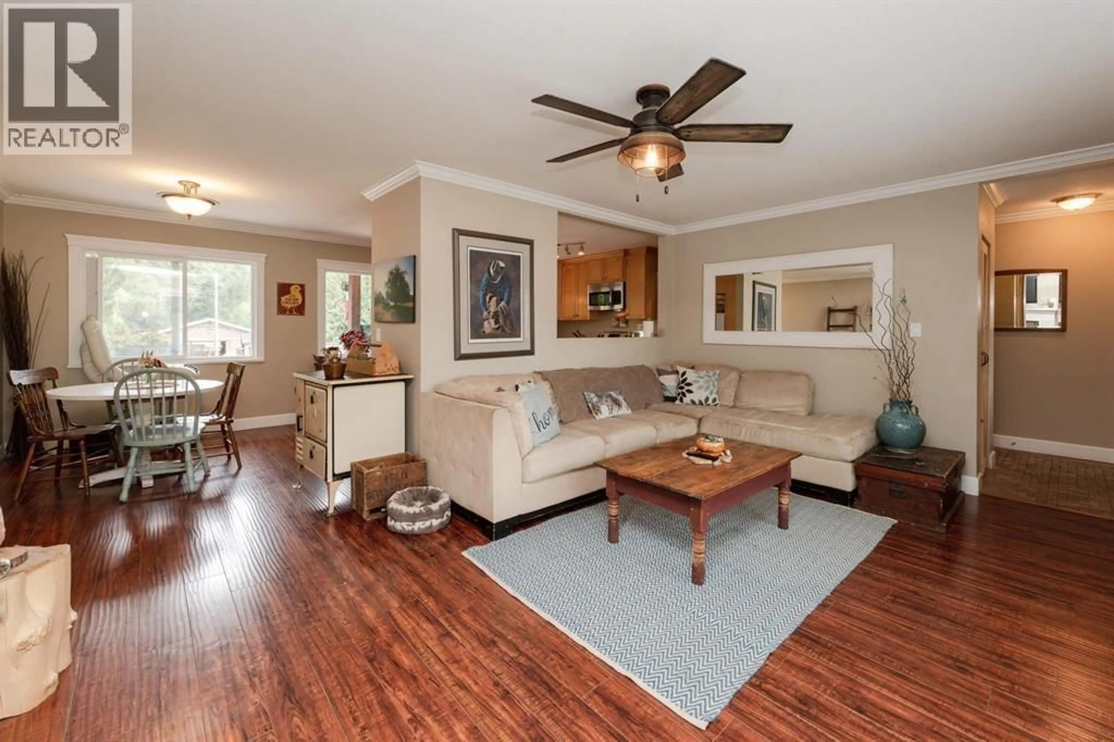 Living room with furniture, wood/laminate floor for 12290 252 STREET, Maple Ridge British Columbia V4R1G6
