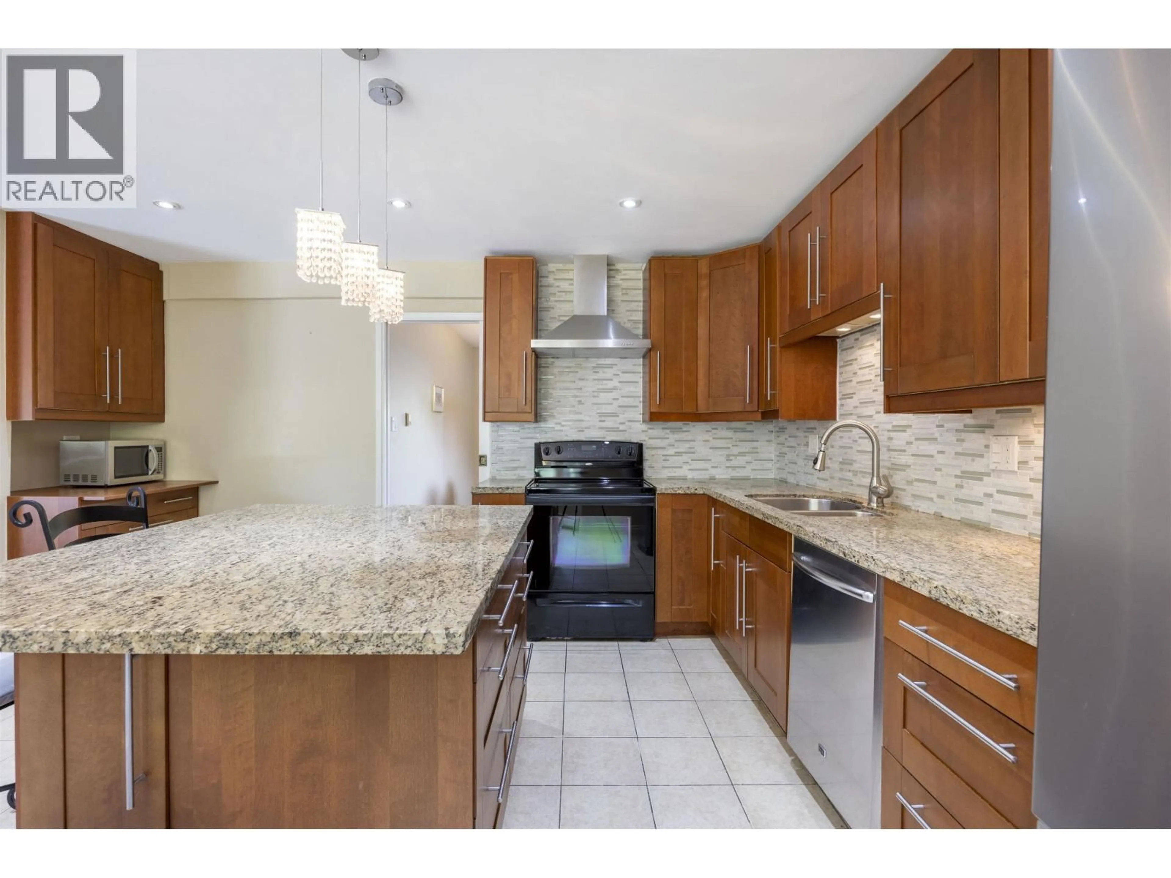 Open concept kitchen, ceramic/tile floor for 10548 CANSO CRESCENT, Richmond British Columbia V7E5B9