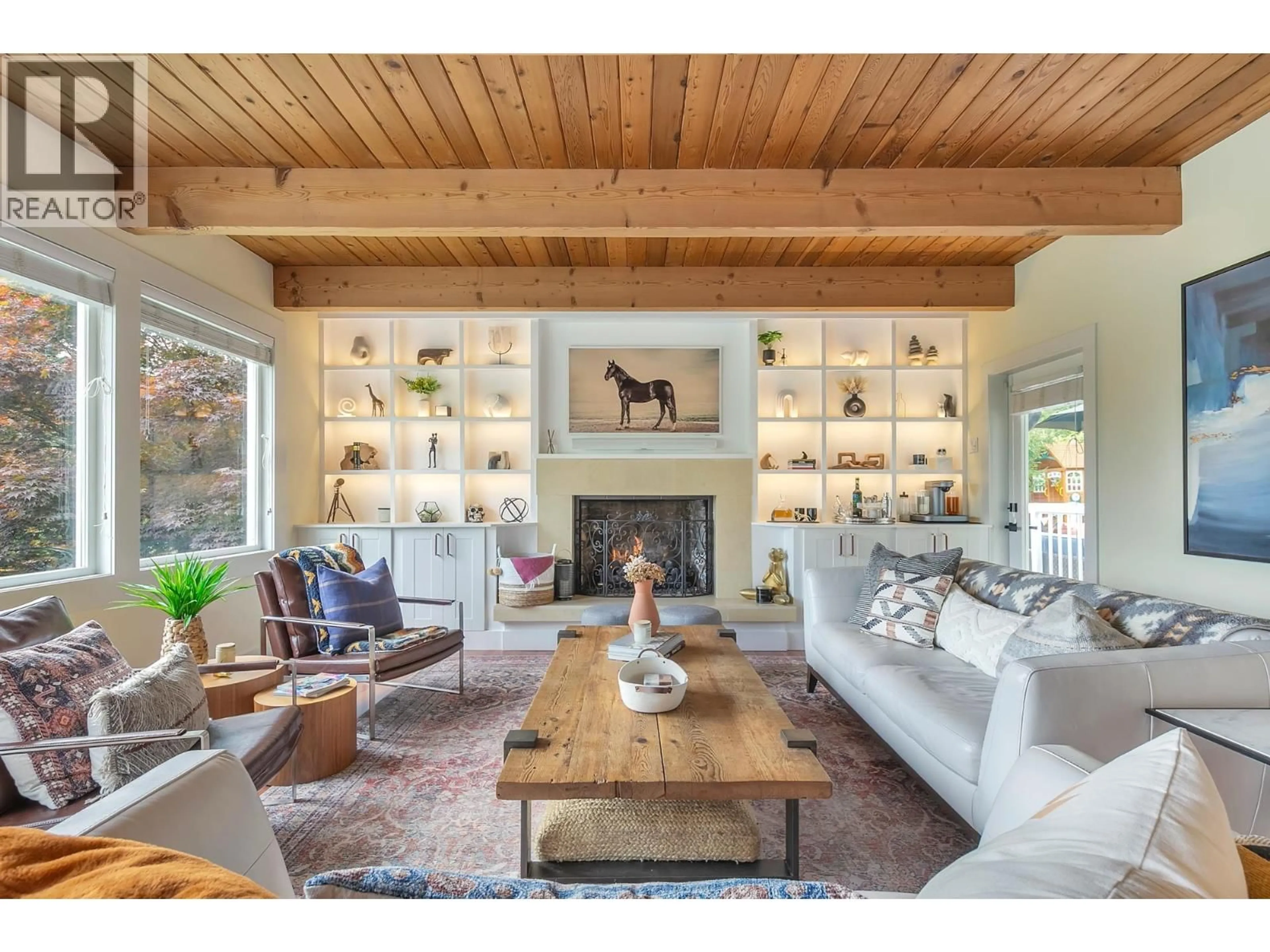 Living room with furniture, wood/laminate floor for 83 GLENMORE DRIVE, West Vancouver British Columbia V7S1A9