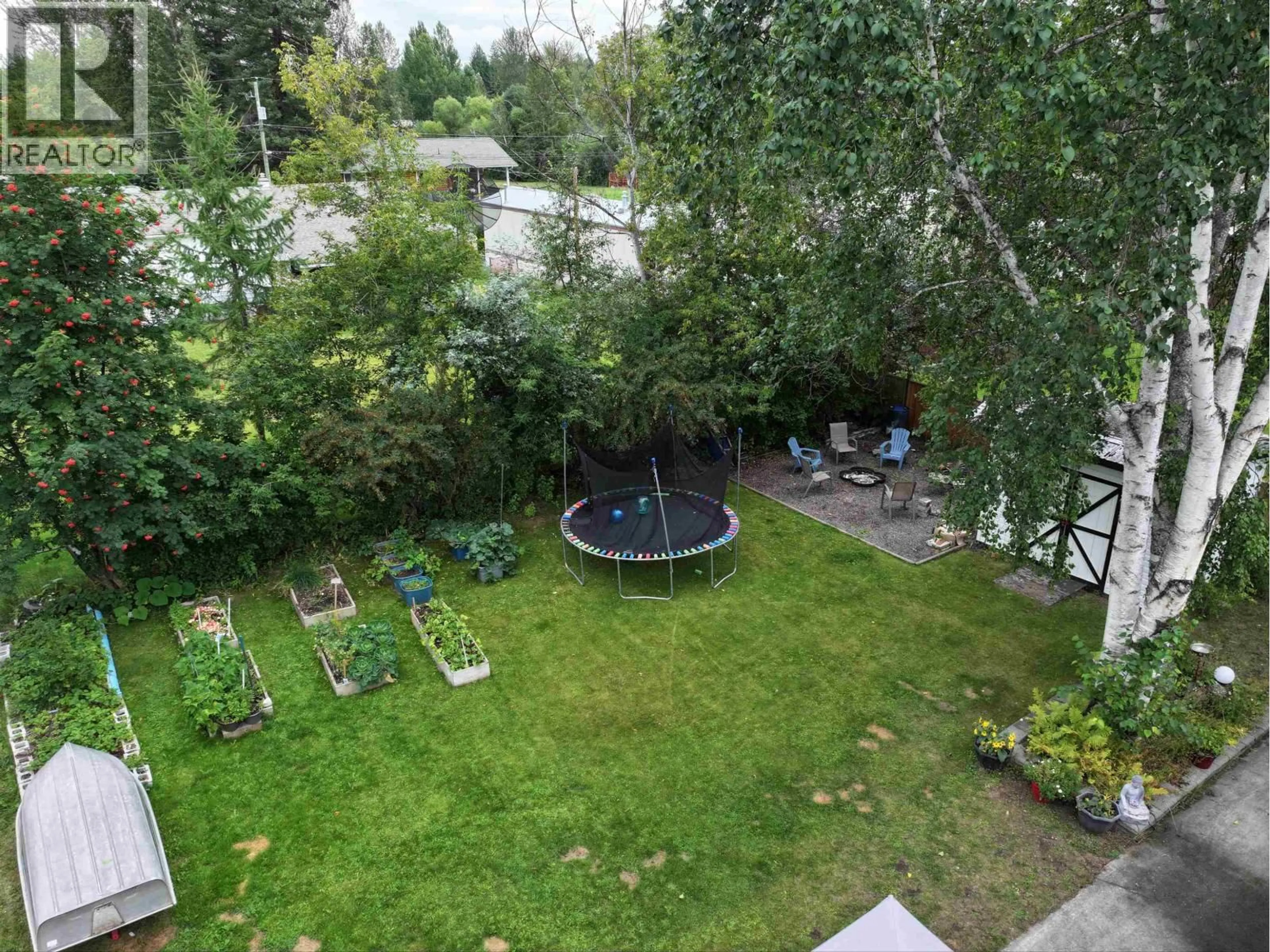 A pic from outside/outdoor area/front of a property/back of a property/a pic from drone, forest/trees view for 1772 POPLAR AVENUE, Quesnel British Columbia V2J3Z5