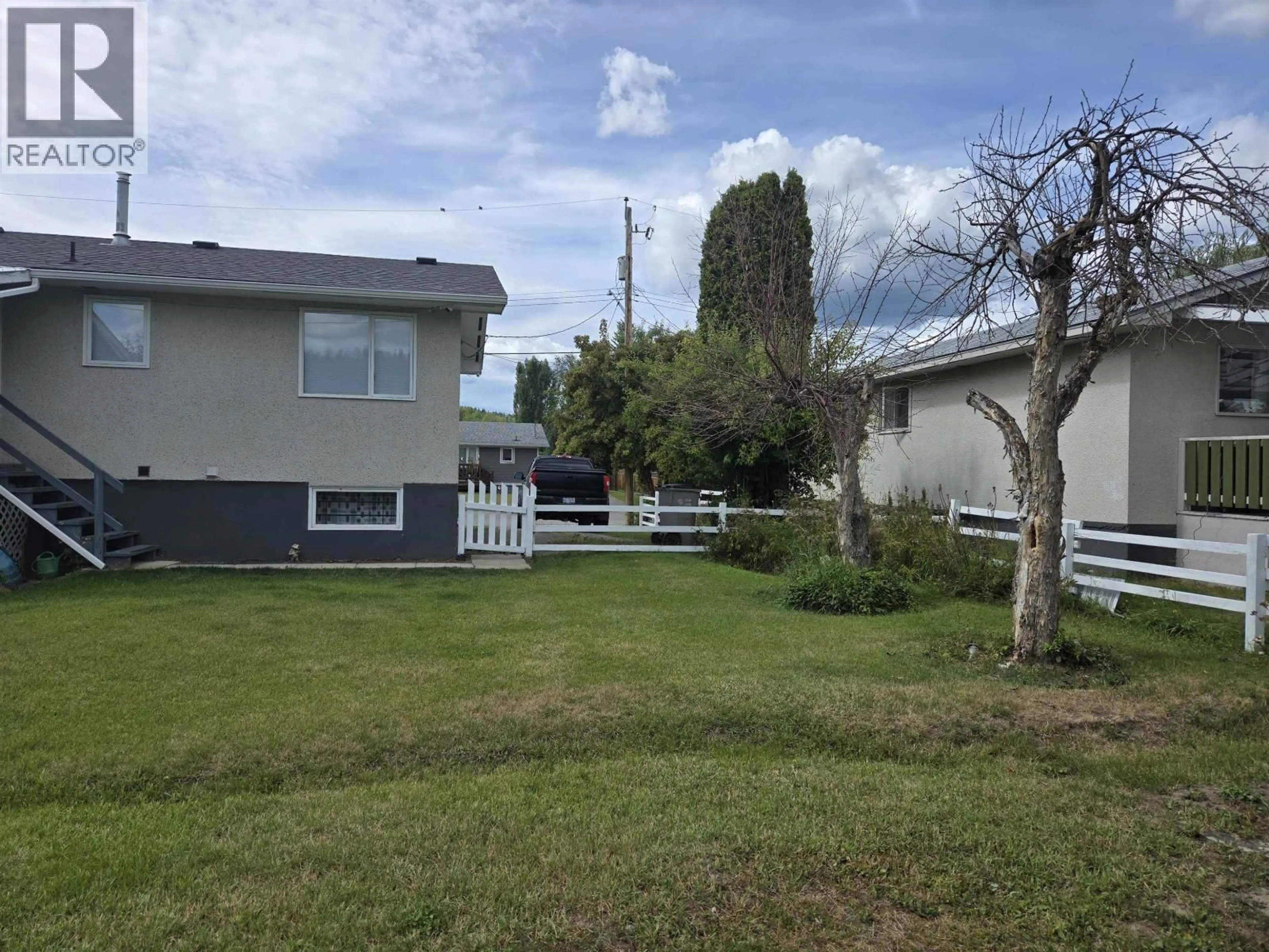 A pic from outside/outdoor area/front of a property/back of a property/a pic from drone, street for 808 REYNARD STREET, Quesnel British Columbia V2J4W1
