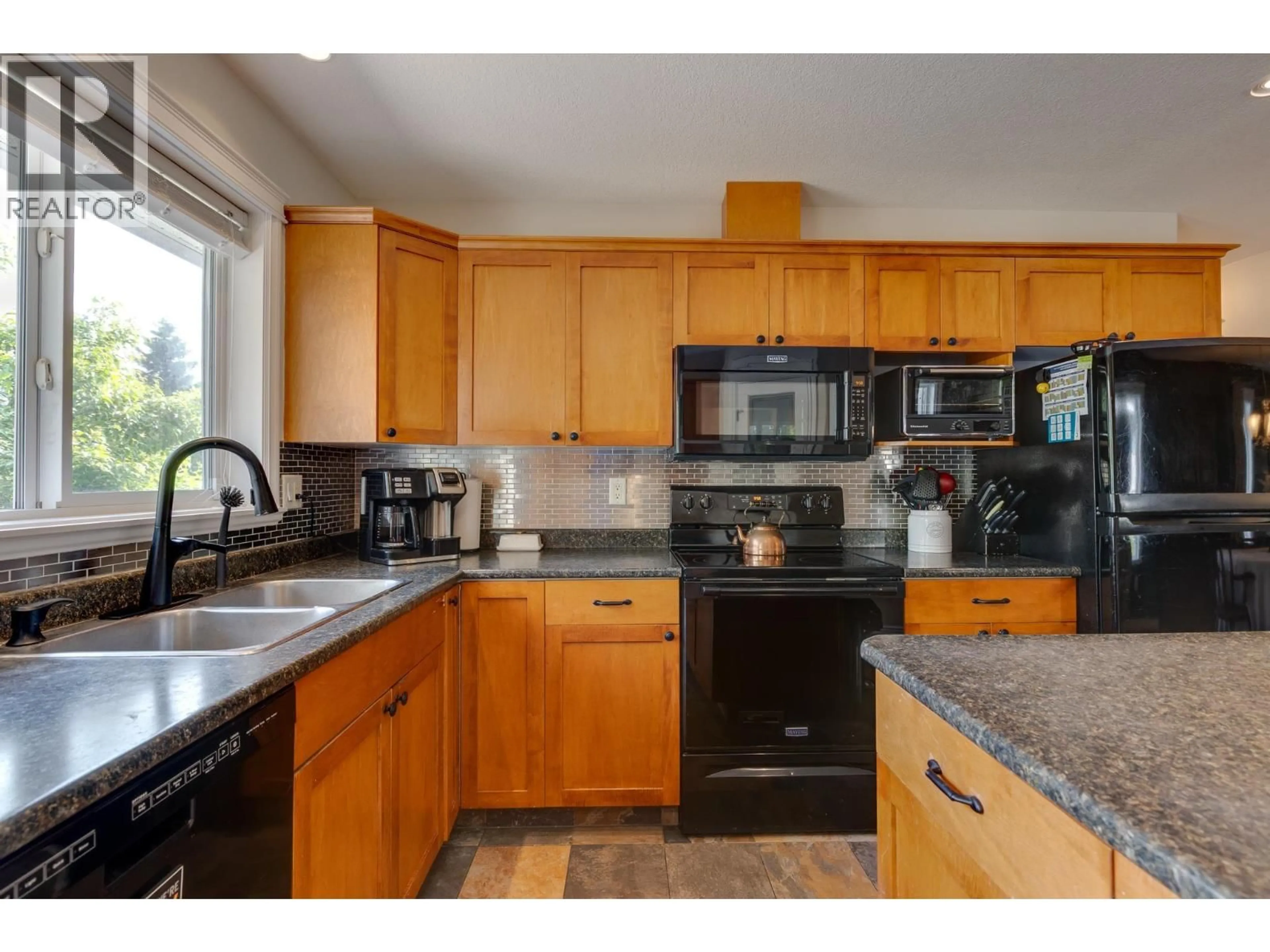 Open concept kitchen, unknown for 1866 BACHINSKI CRESCENT, Prince George British Columbia V2N6S8