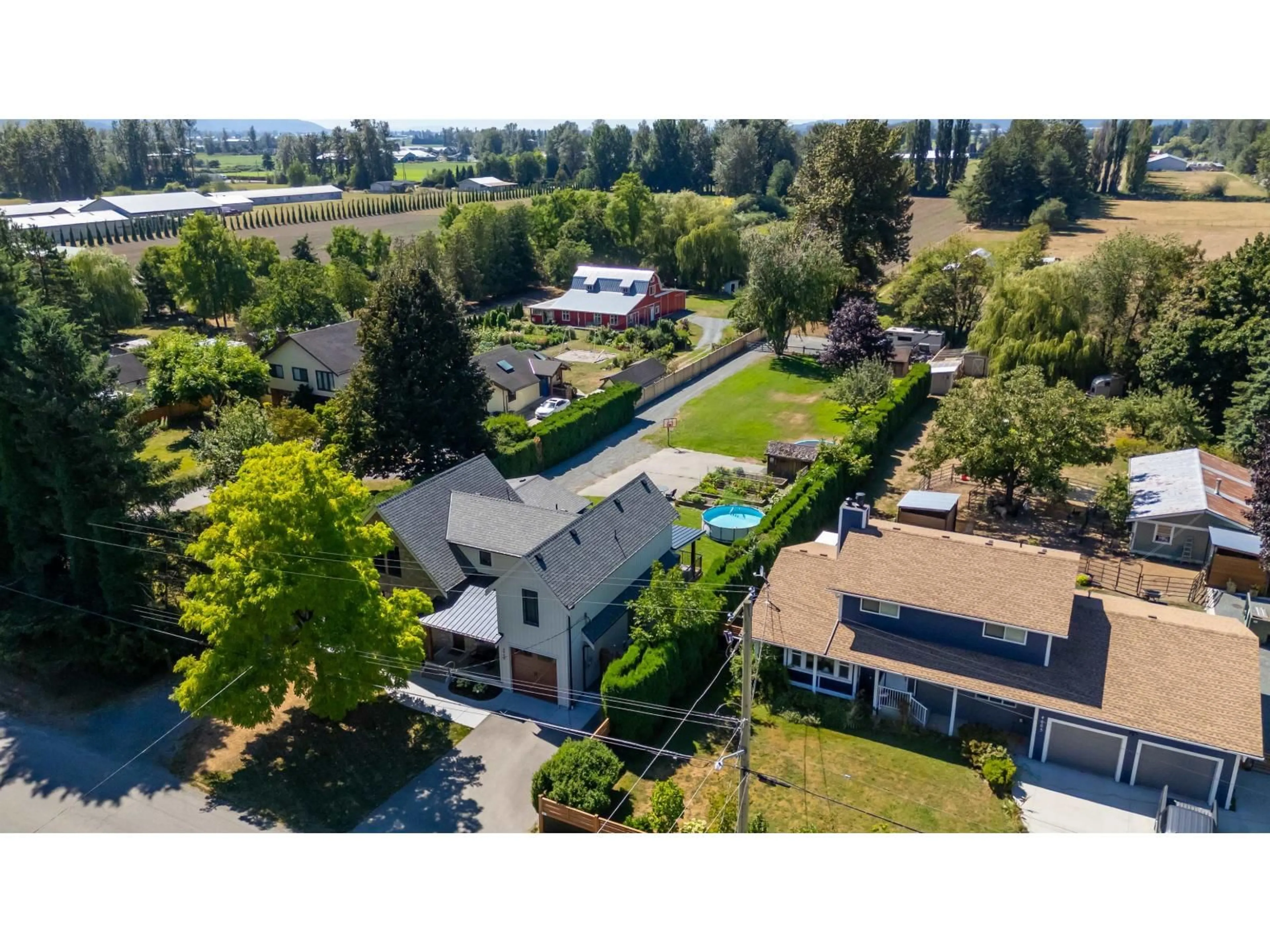 A pic from outside/outdoor area/front of a property/back of a property/a pic from drone, unknown for 3995 STEWART ROAD, Yarrow British Columbia V2R5G7
