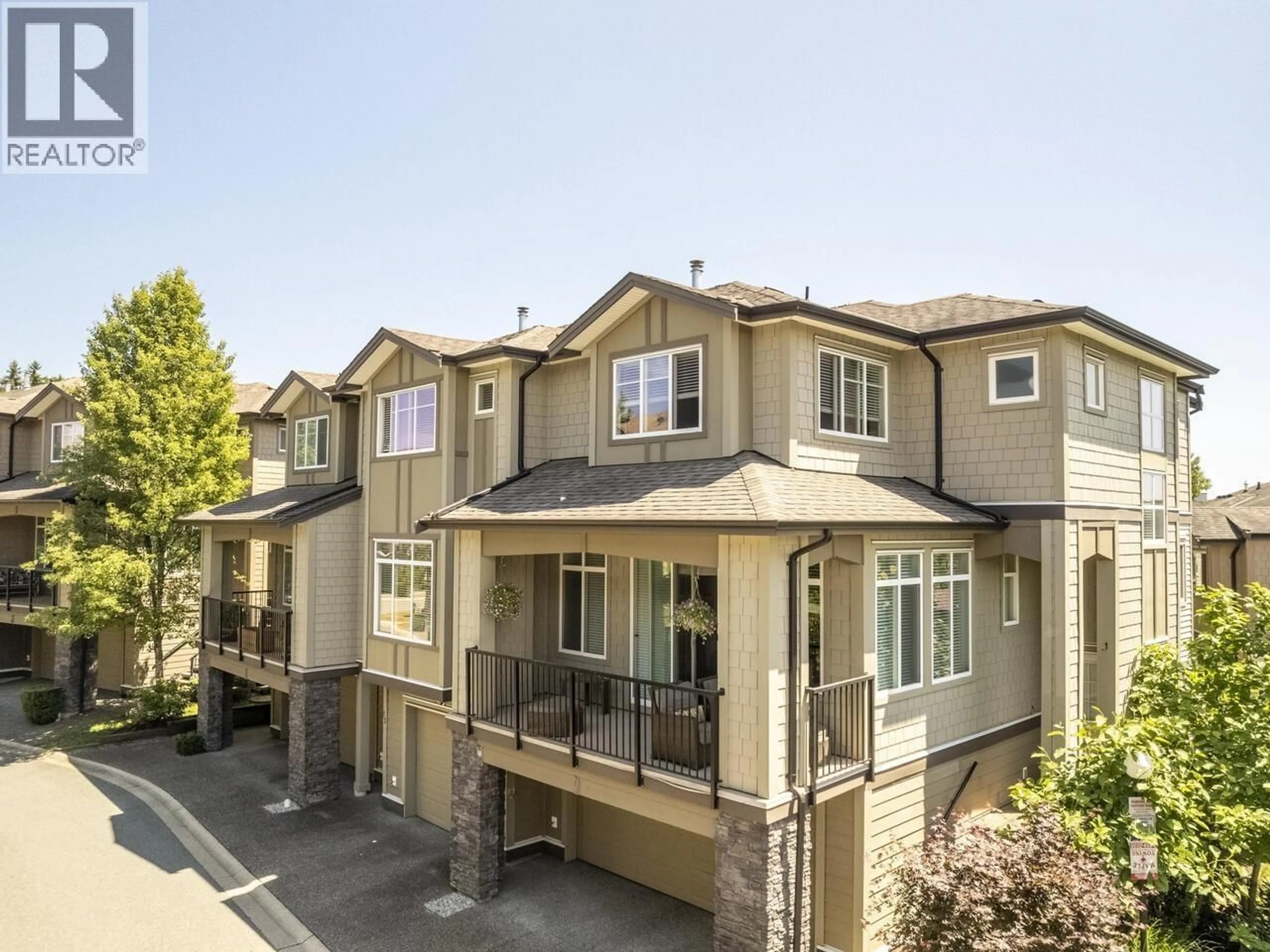 A pic from outside/outdoor area/front of a property/back of a property/a pic from drone, street for 72 - 22865 TELOSKY AVENUE, Maple Ridge British Columbia V2X8Z9
