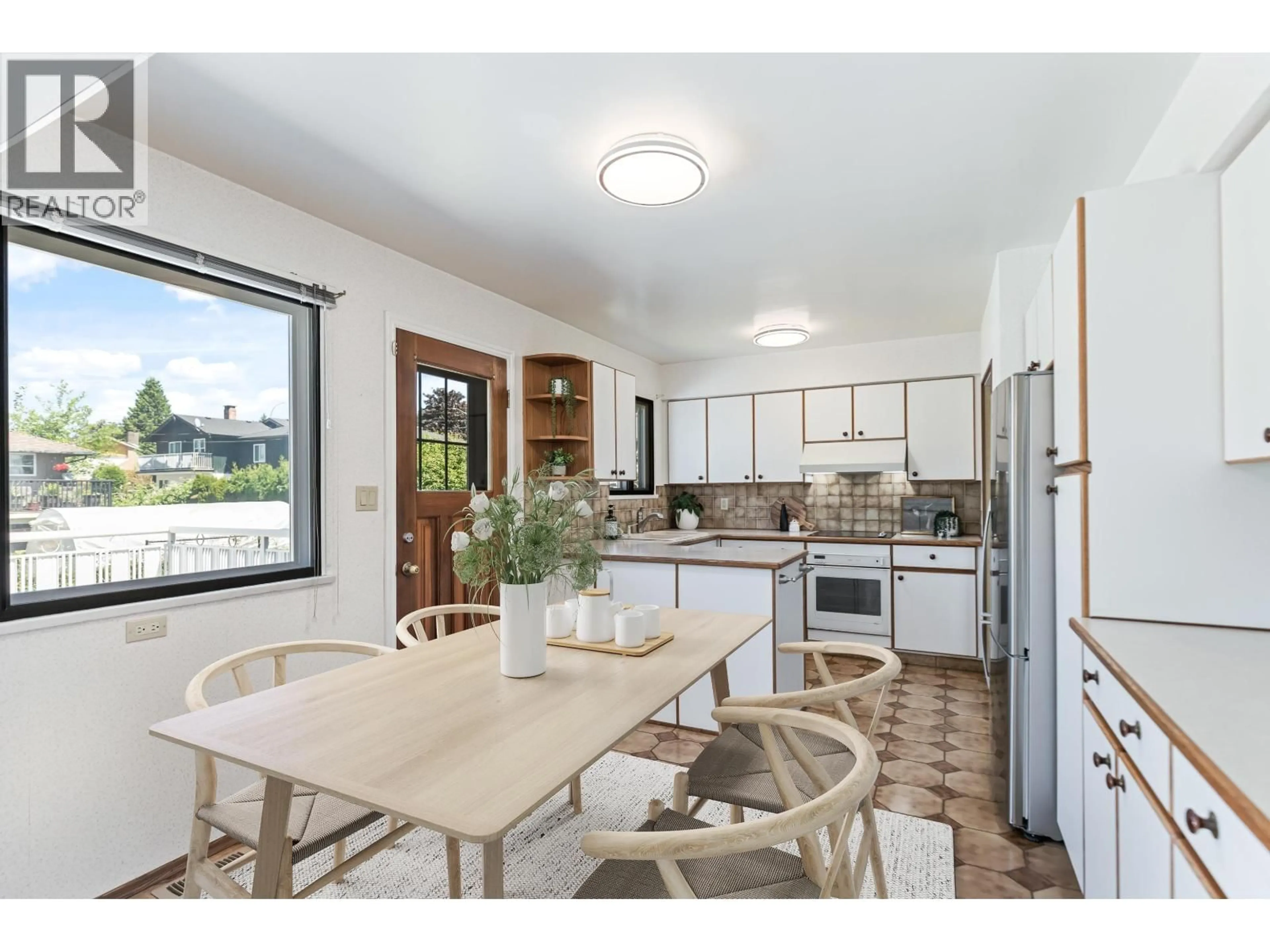 Open concept kitchen, ceramic/tile floor for 805 EVERETT CRESCENT, Burnaby British Columbia V5A2N3