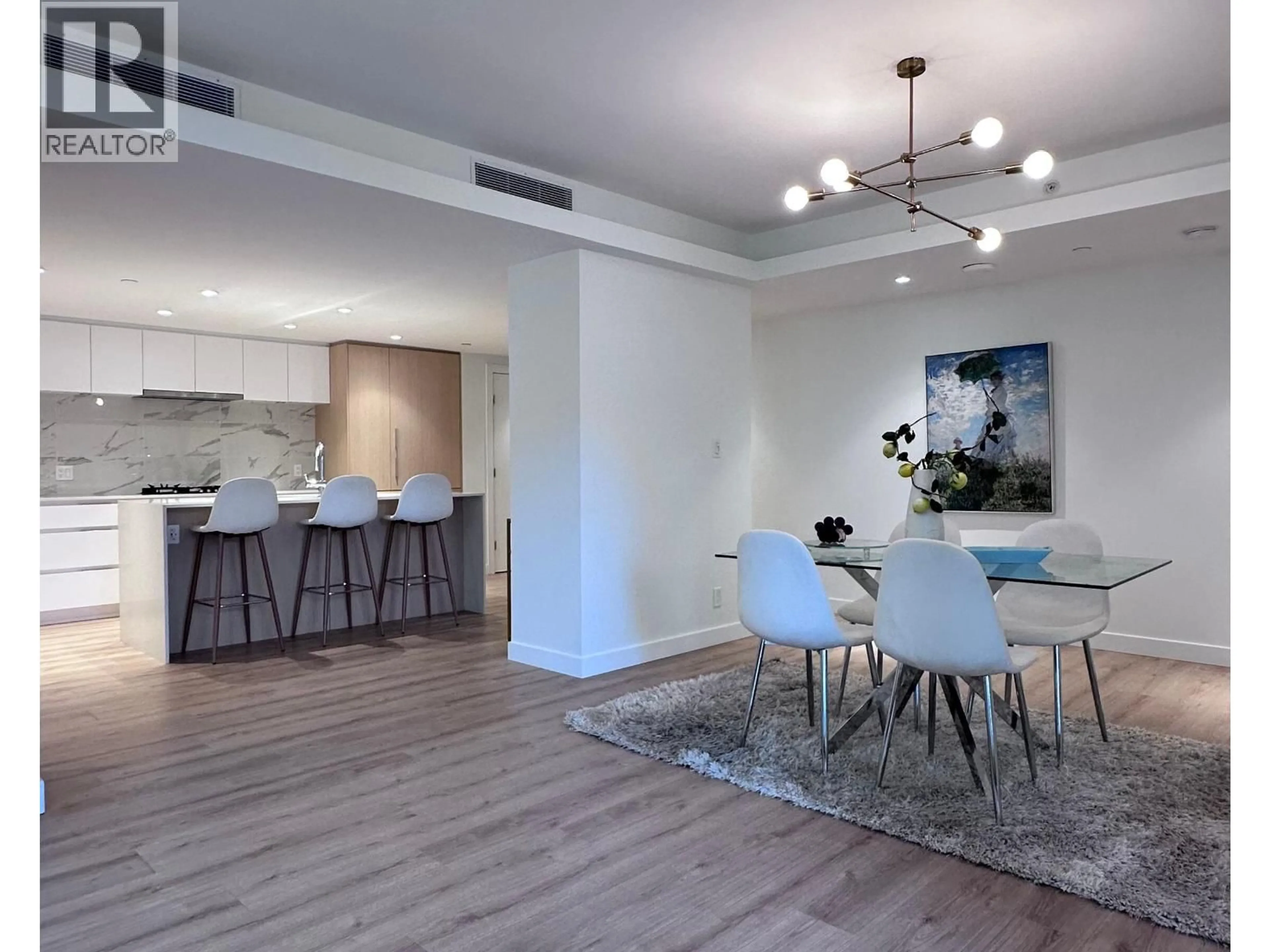 Open concept kitchen, wood/laminate floor for 304 - 1500 FERN STREET, North Vancouver British Columbia V7J0E6