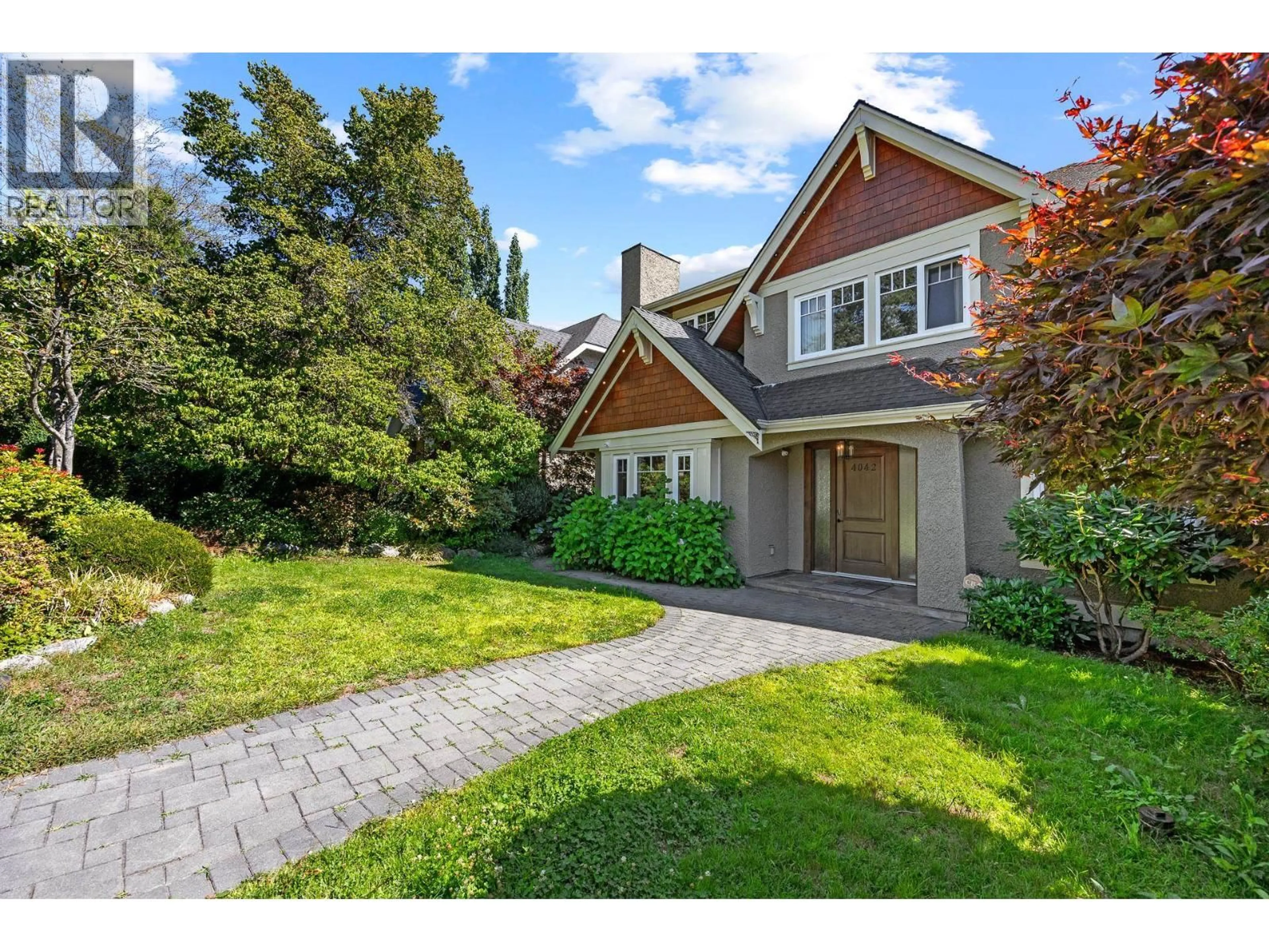 Home with brick exterior material, street for 4042 34TH AVENUE, Vancouver British Columbia V6N2L7