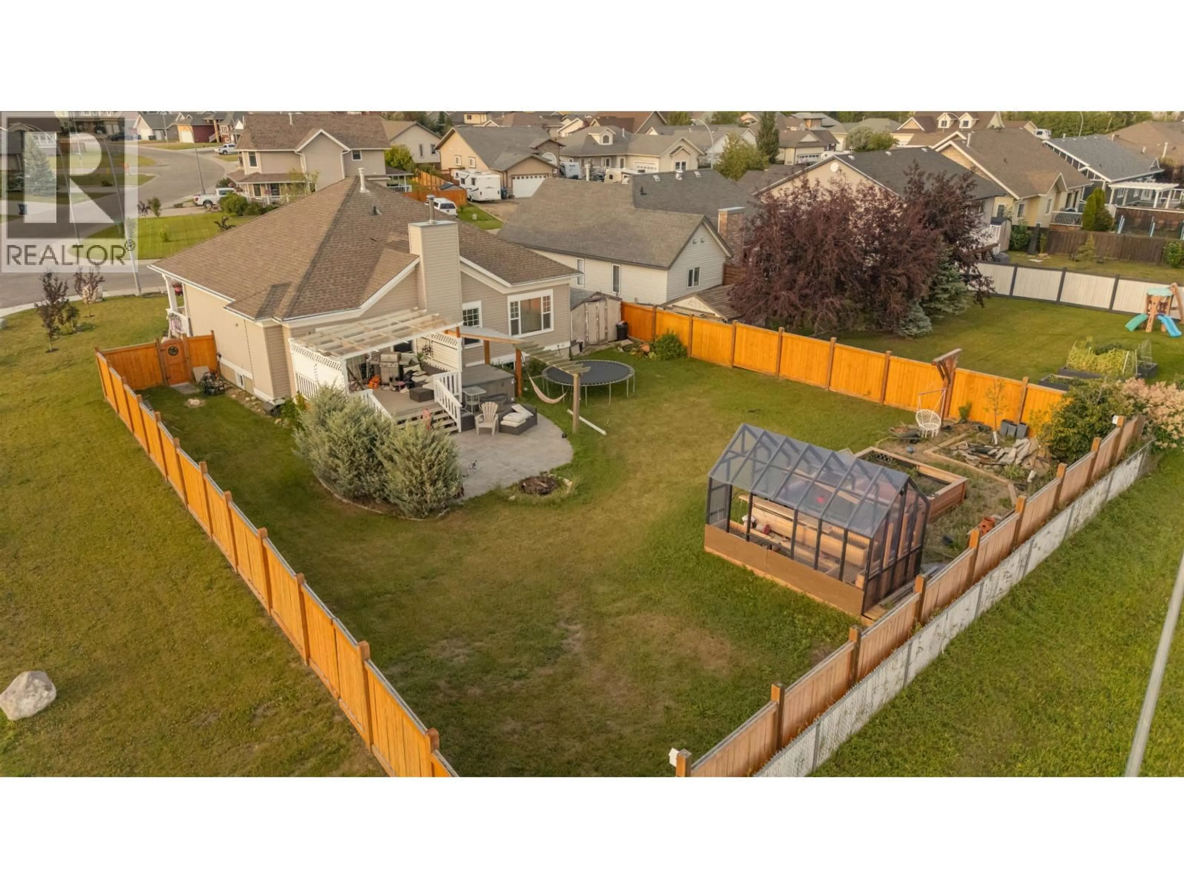 A pic from outside/outdoor area/front of a property/back of a property/a pic from drone, mountain view for 8723 109 AVENUE, Fort St. John British Columbia V1J7E6