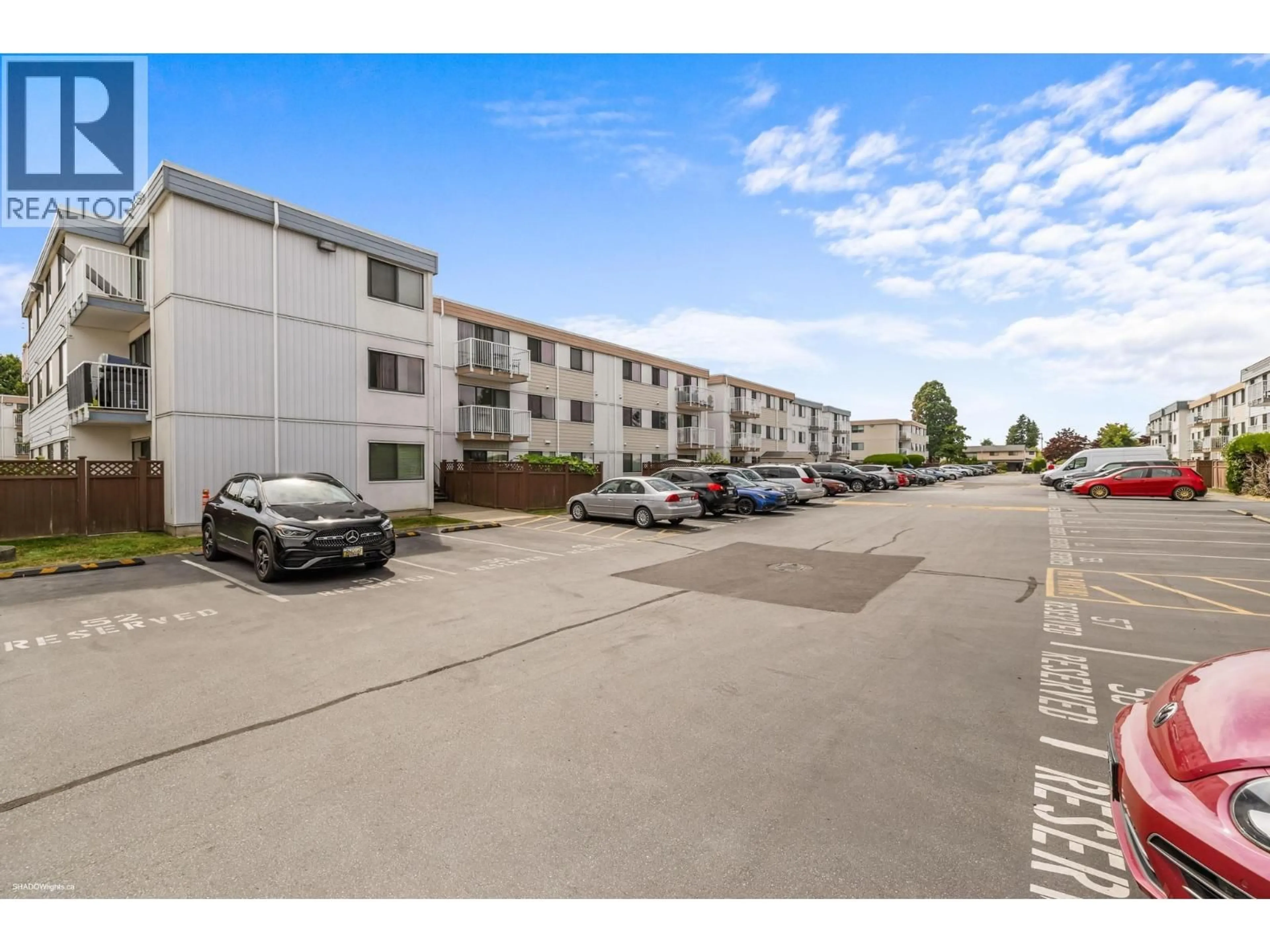A pic from outside/outdoor area/front of a property/back of a property/a pic from drone, street for 211 - 7260 LINDSAY ROAD, Richmond British Columbia V7C3M6