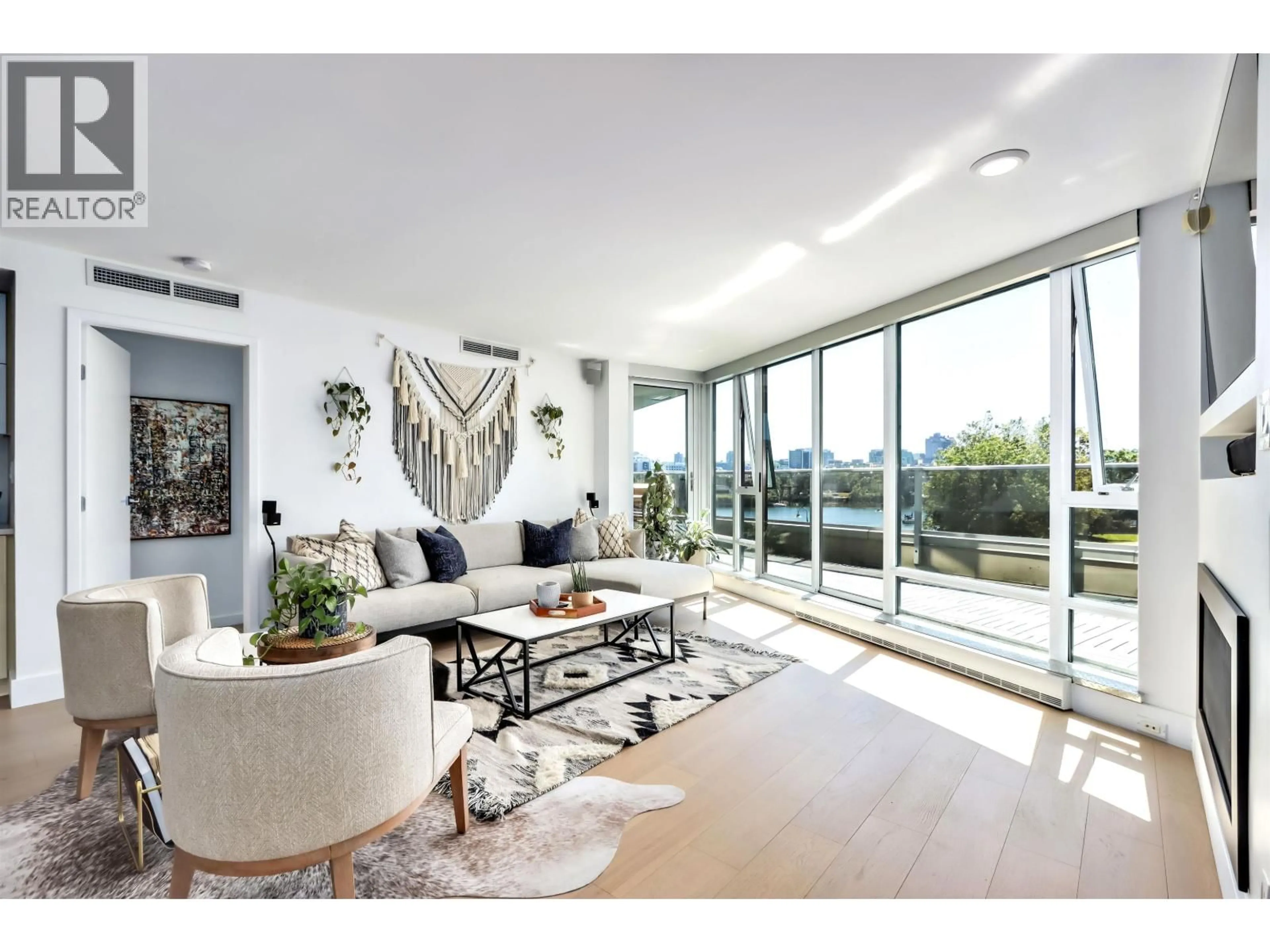 Living room with furniture, unknown for 303 - 8 SMITHE MEWS, Vancouver British Columbia V6B0A5
