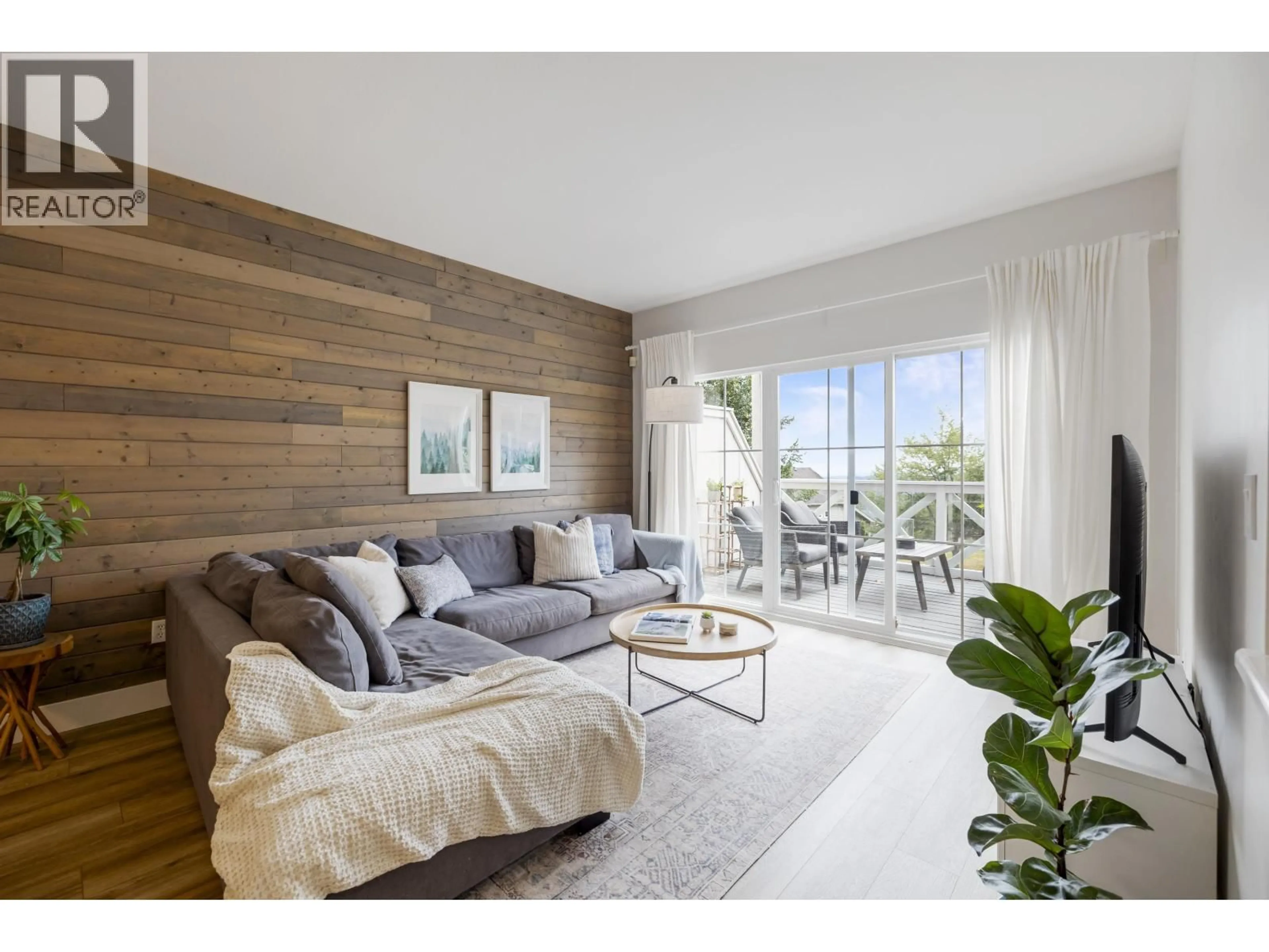 Living room with furniture, wood/laminate floor for 23 HICKORY DRIVE, Port Moody British Columbia V3H5L9