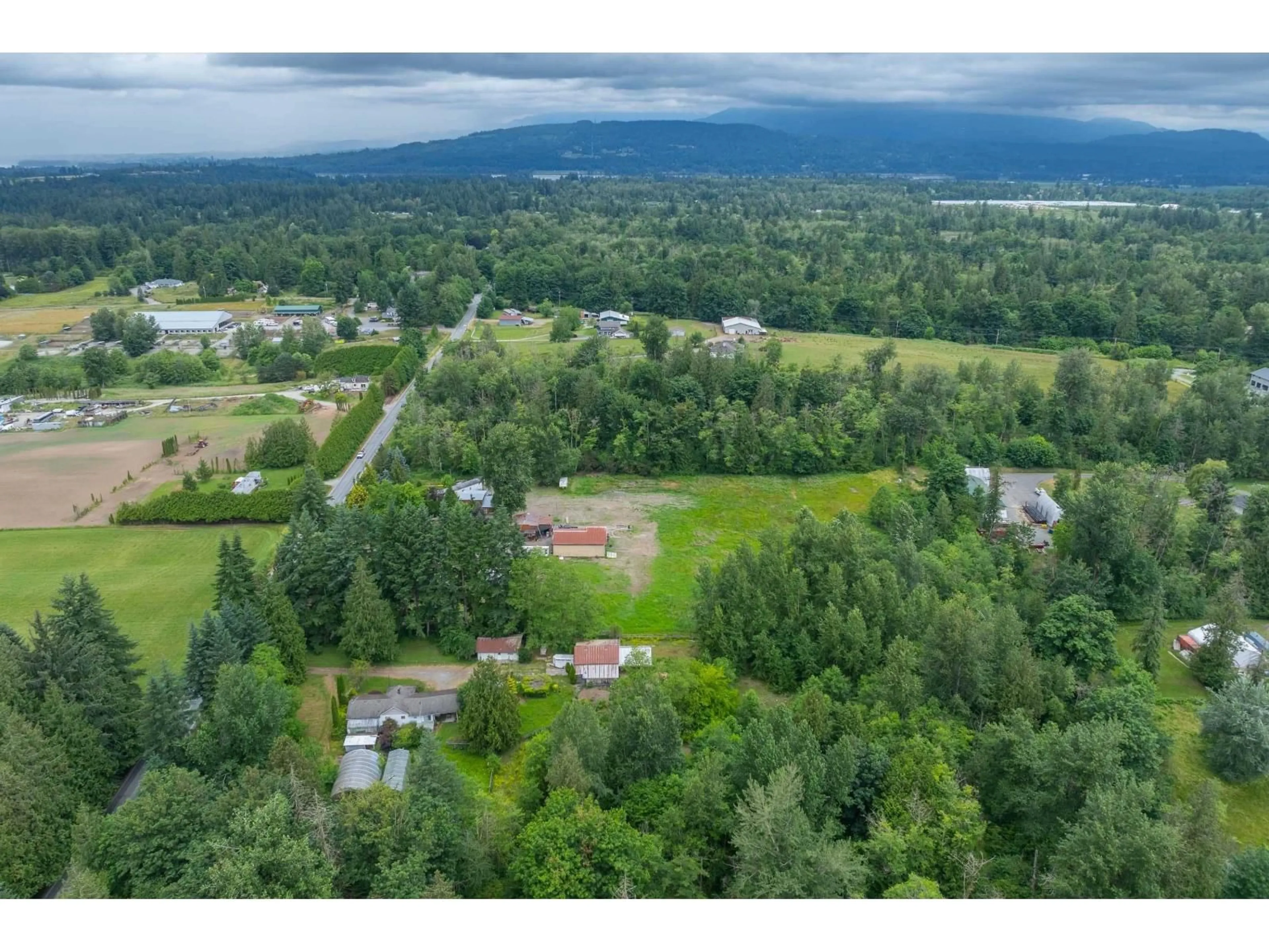 A pic from outside/outdoor area/front of a property/back of a property/a pic from drone, water/lake/river/ocean view for 6578 256, Langley British Columbia V4W1T8