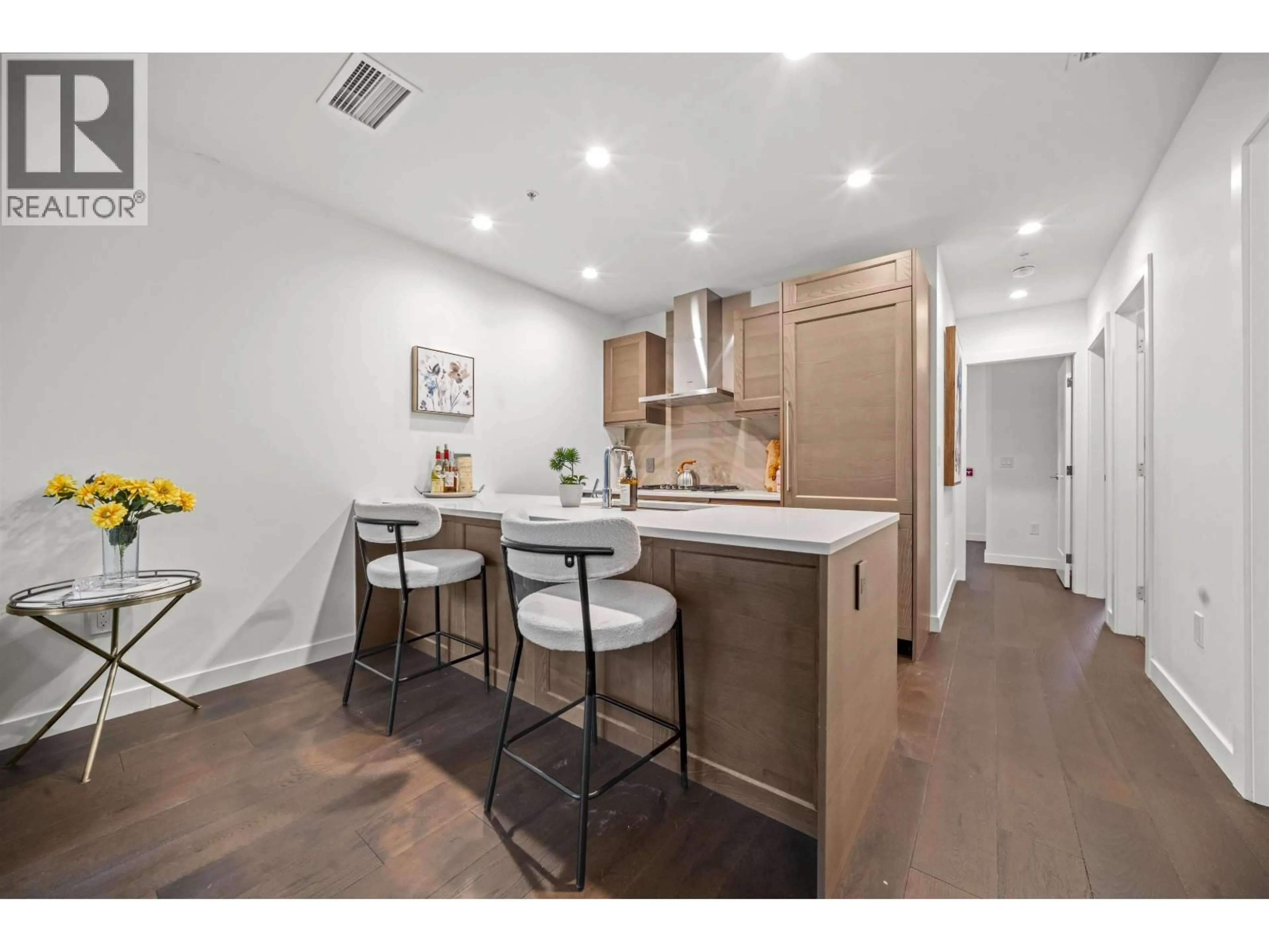 Open concept kitchen, wood/laminate floor for 103 - 5681 BIRNEY AVENUE, Vancouver British Columbia V6S0L5