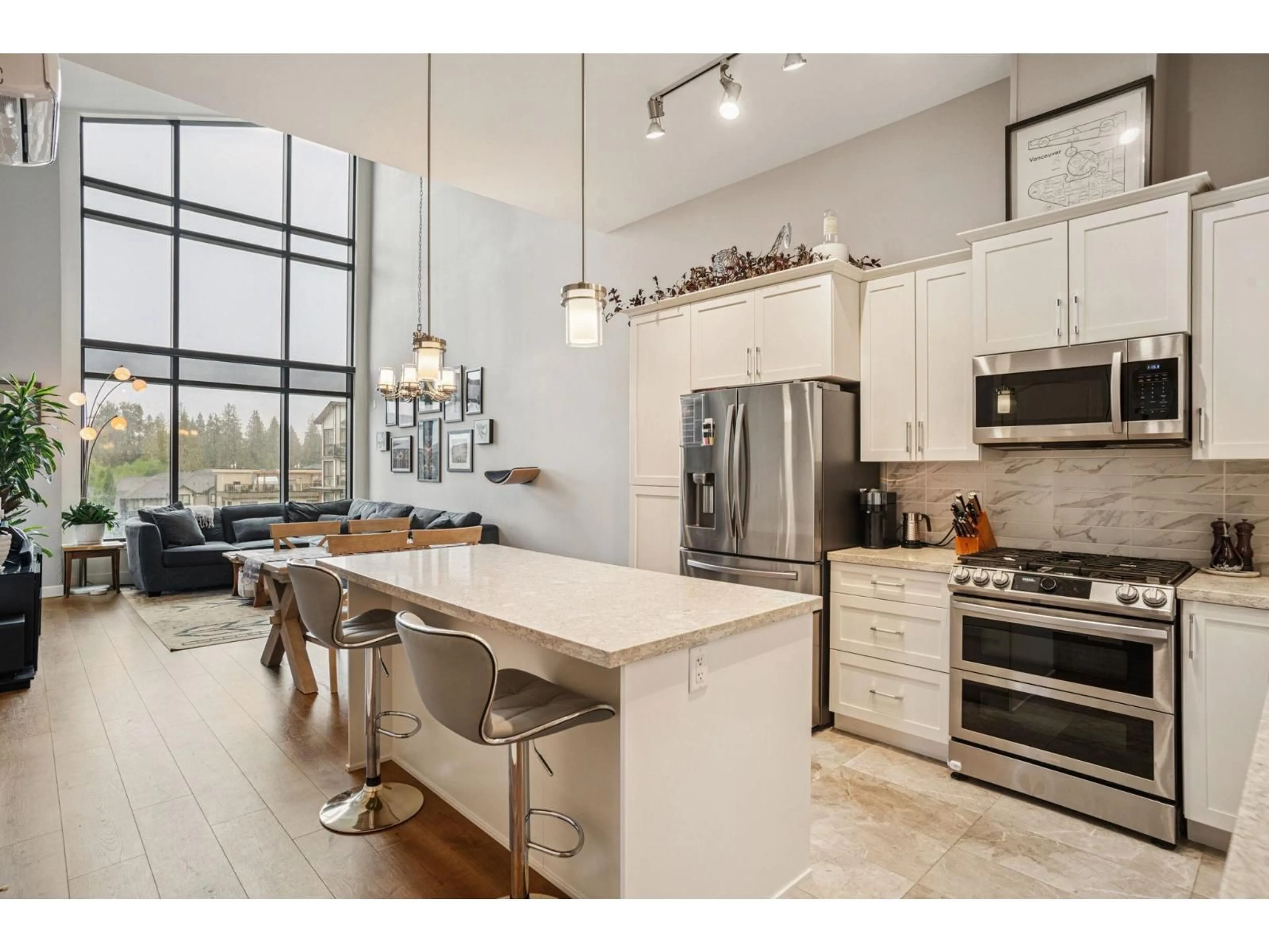 Open concept kitchen, ceramic/tile floor for 610 - 8561 203A, Langley British Columbia V2Y3L7