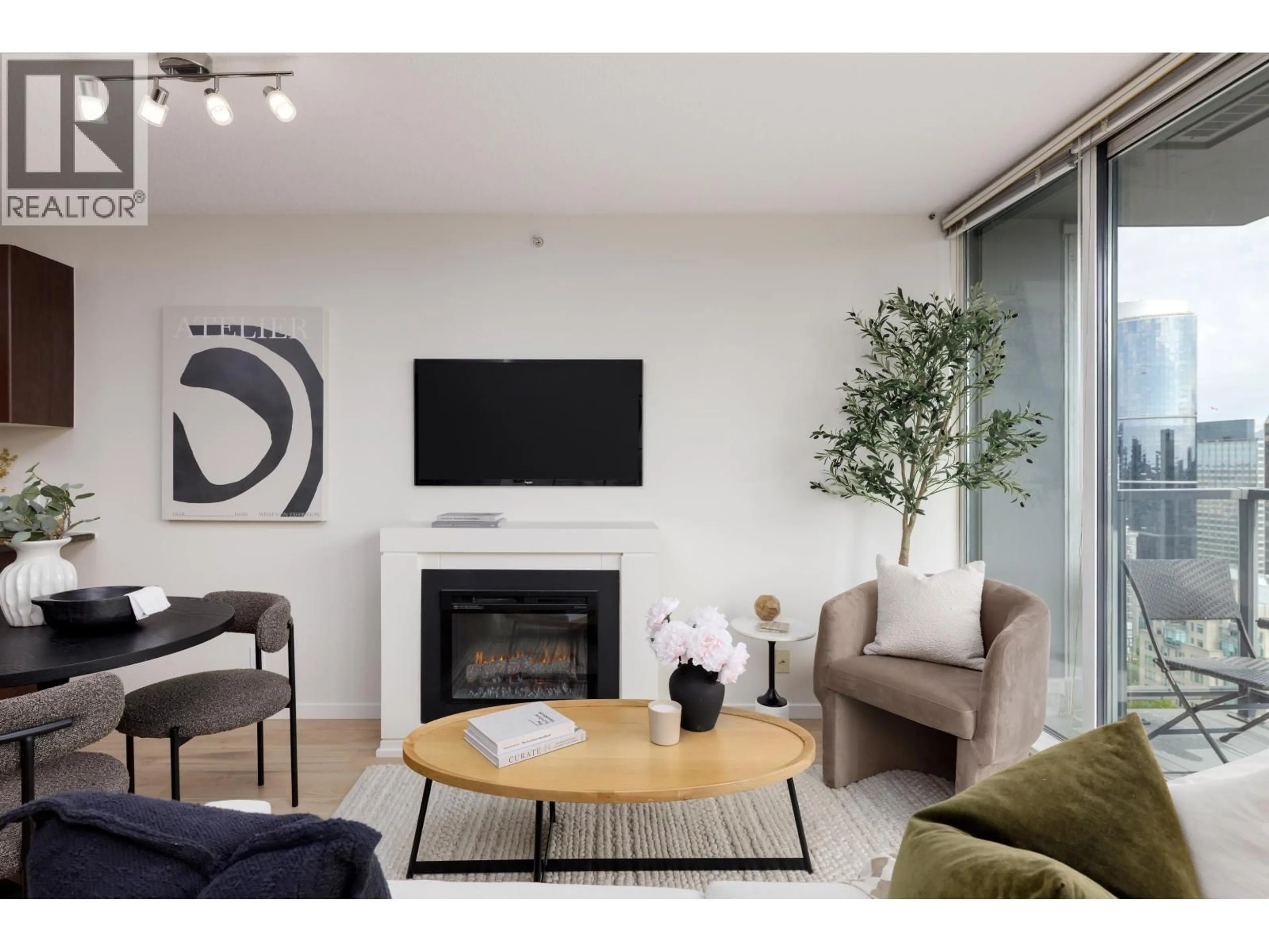 Living room with furniture, wood/laminate floor for 2903 - 1199 SEYMOUR STREET, Vancouver British Columbia V6B1K3